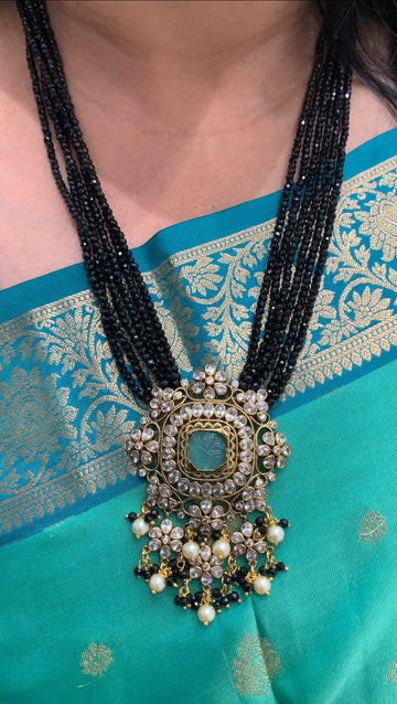 Beautiful pendent with black beads