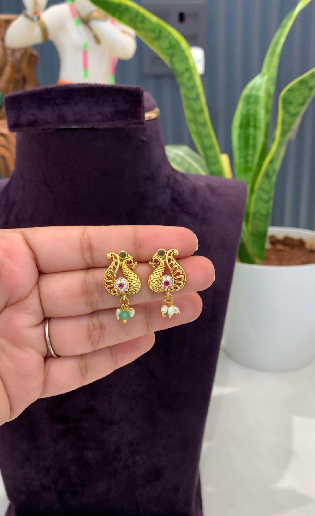 Beautiful peacock studs