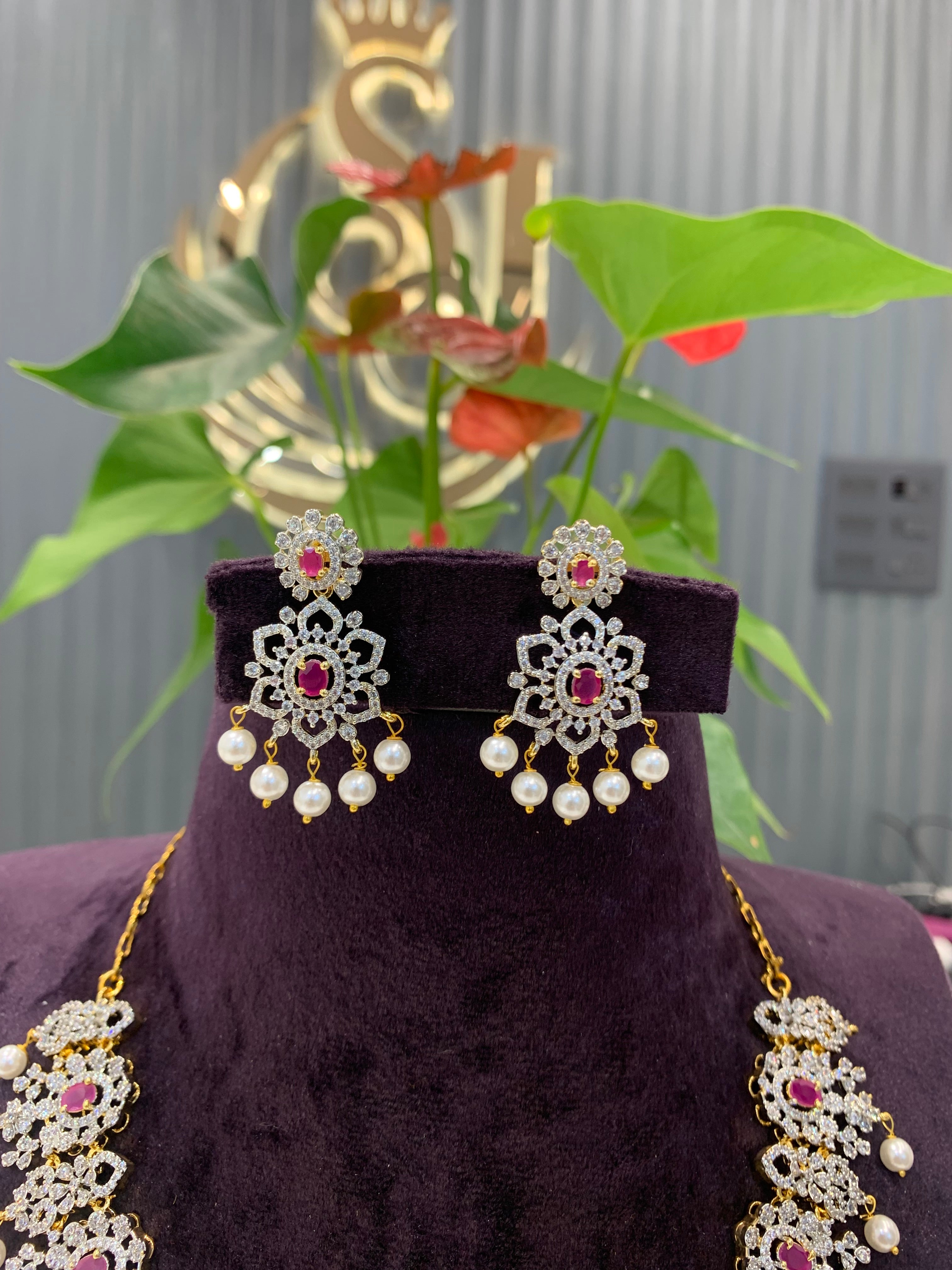 Beautiful GJ polish short necklace with pink stone