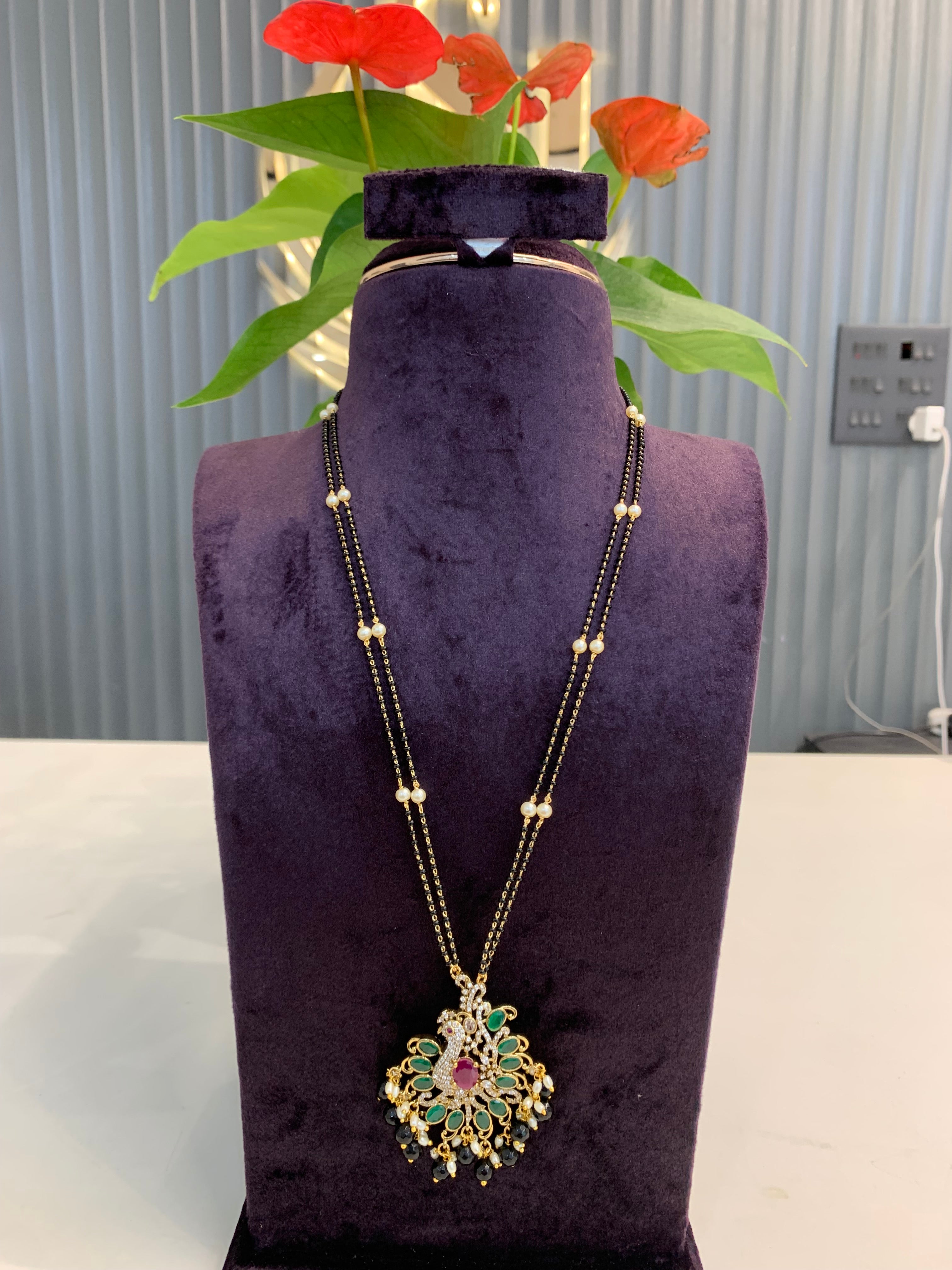 Beautiful Peacock Locket with 24 inch long Black beads