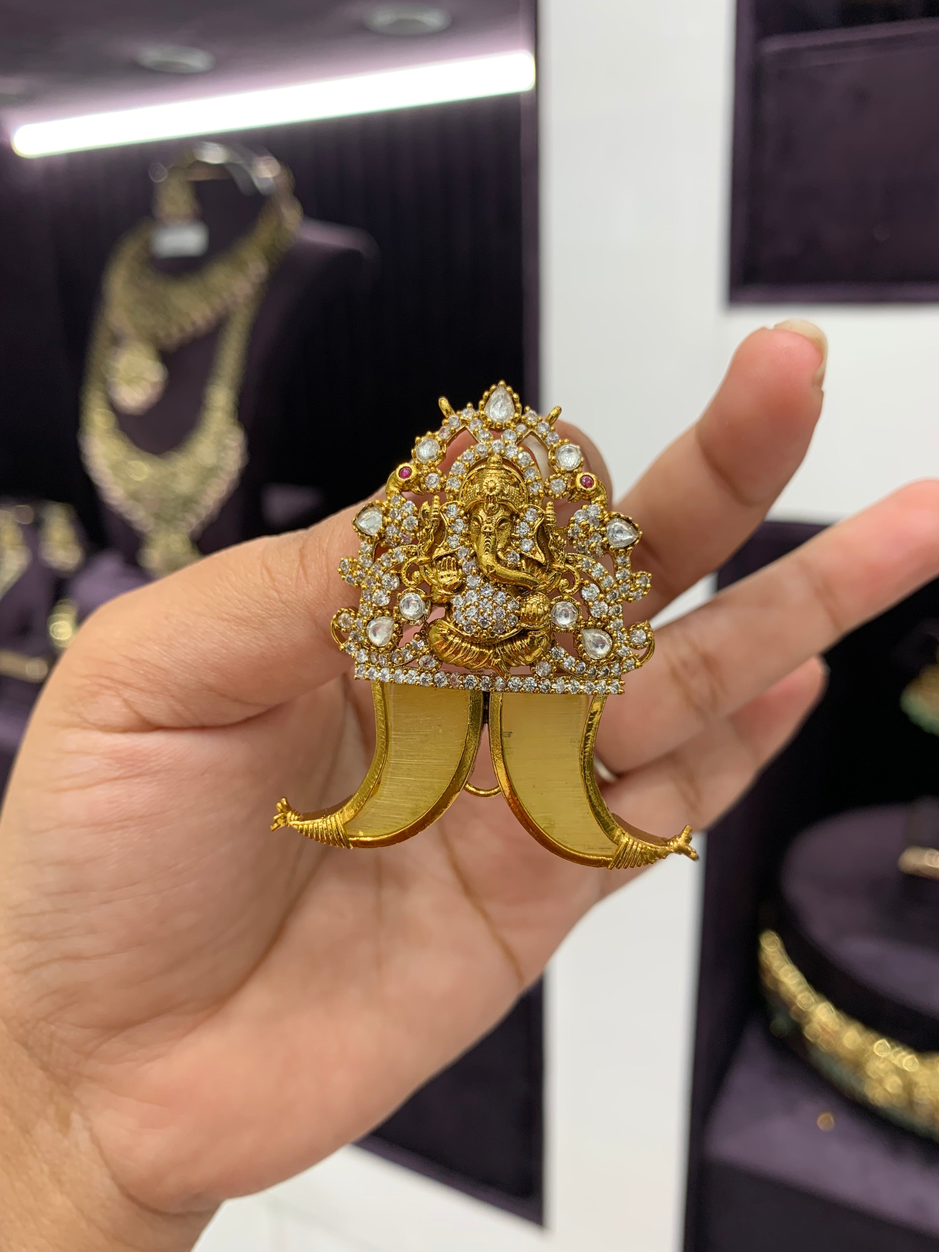 Beautiful ganesh tiger nail with back hook