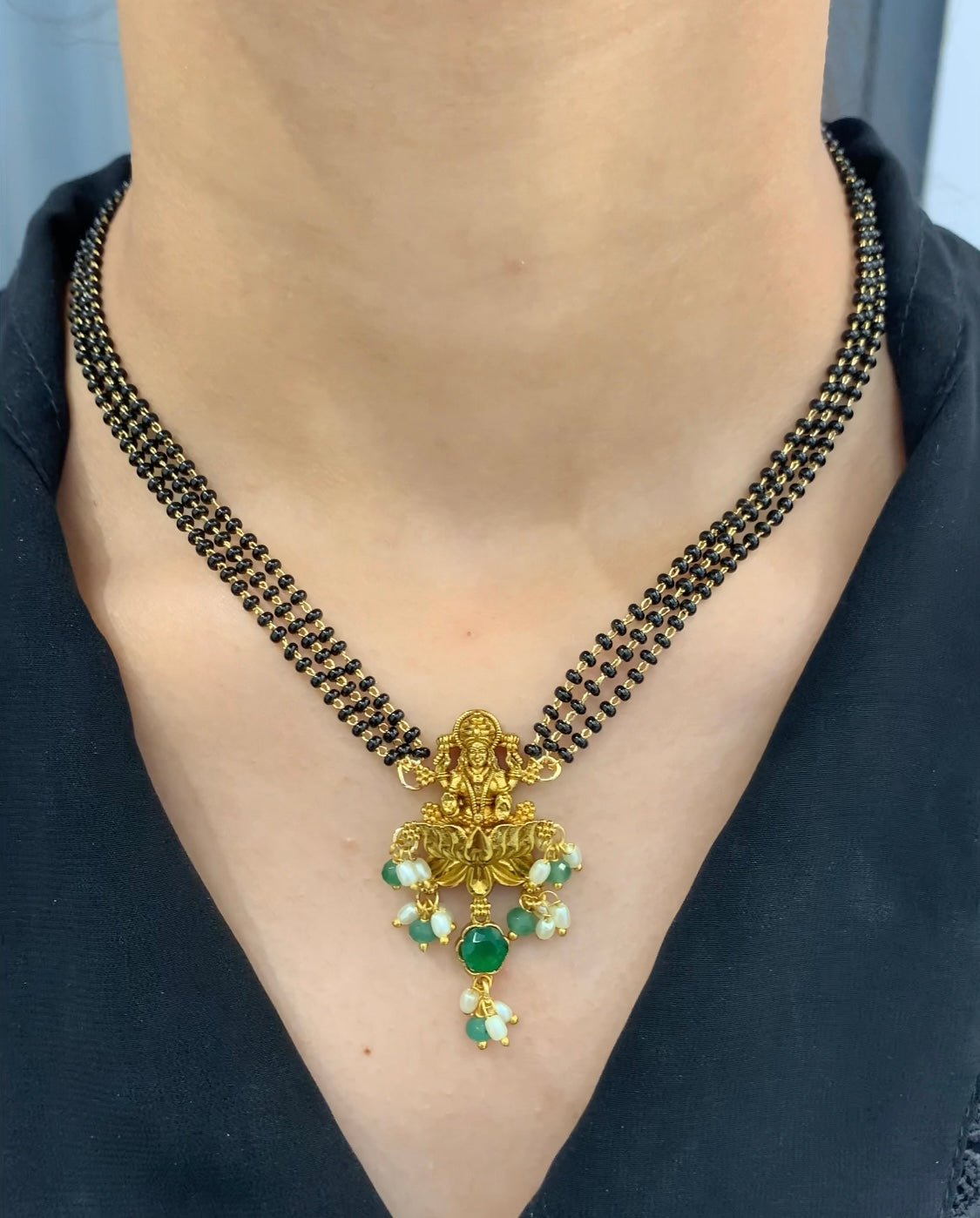 Beautiful Lakshmi Nakshi Locket with 3 line black beads 16 inches