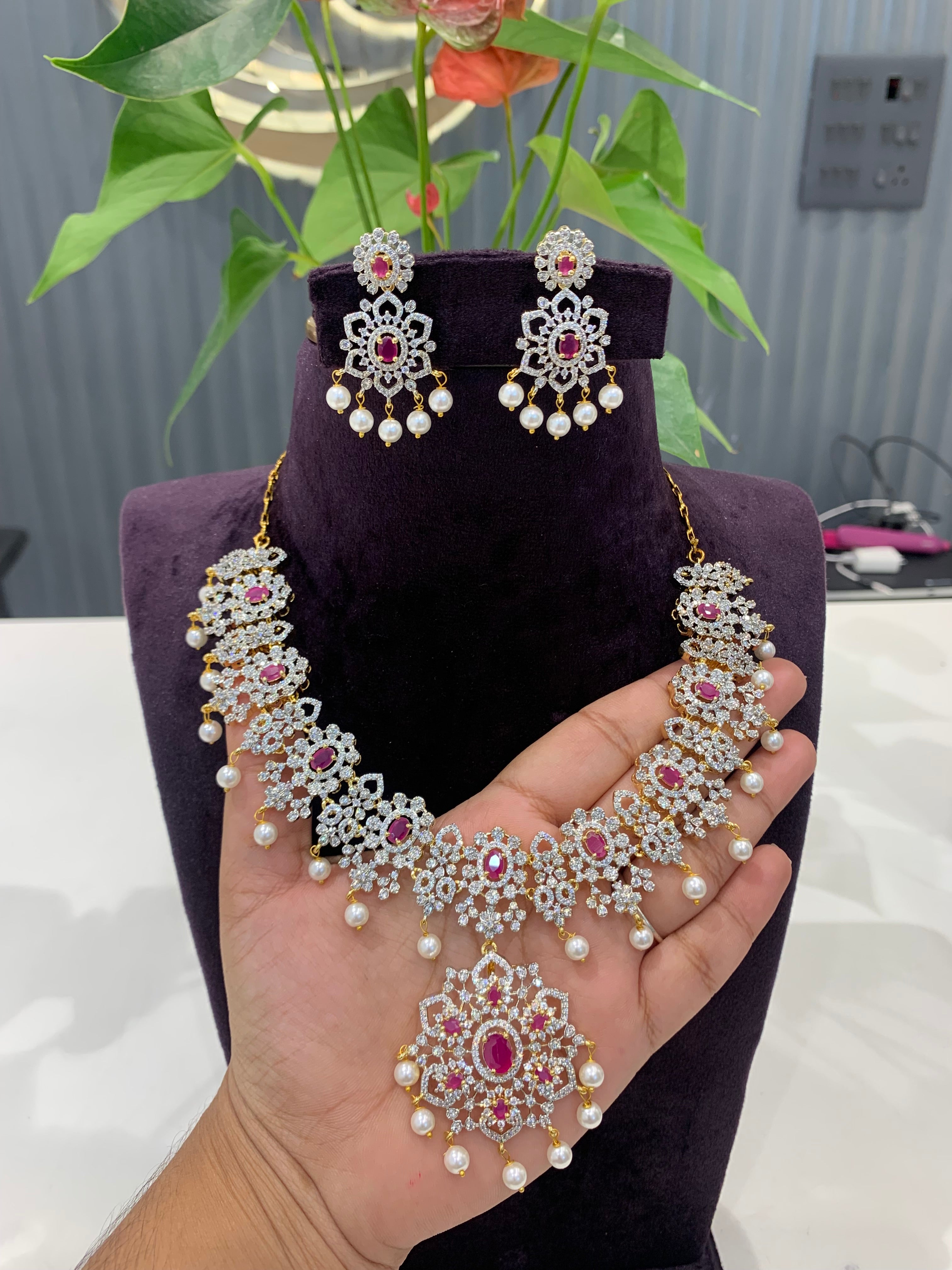 Beautiful GJ polish short necklace with pink stone