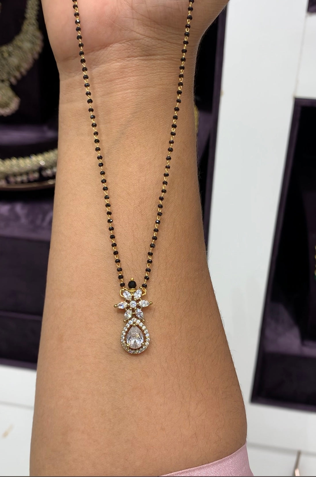 Beautiful locket with black beads