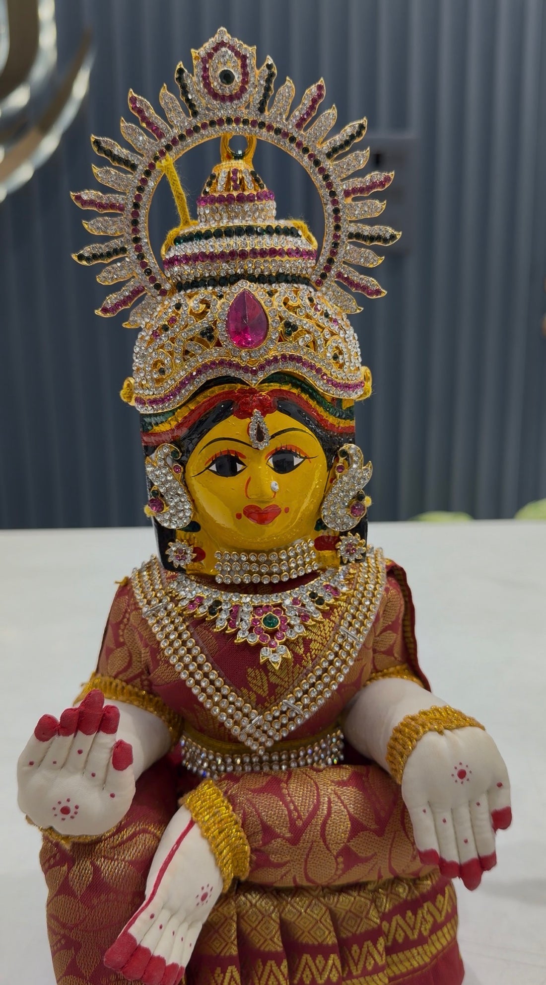 Beautiful meroon colour ammavari idol height 13 inchs with face width 6inchs