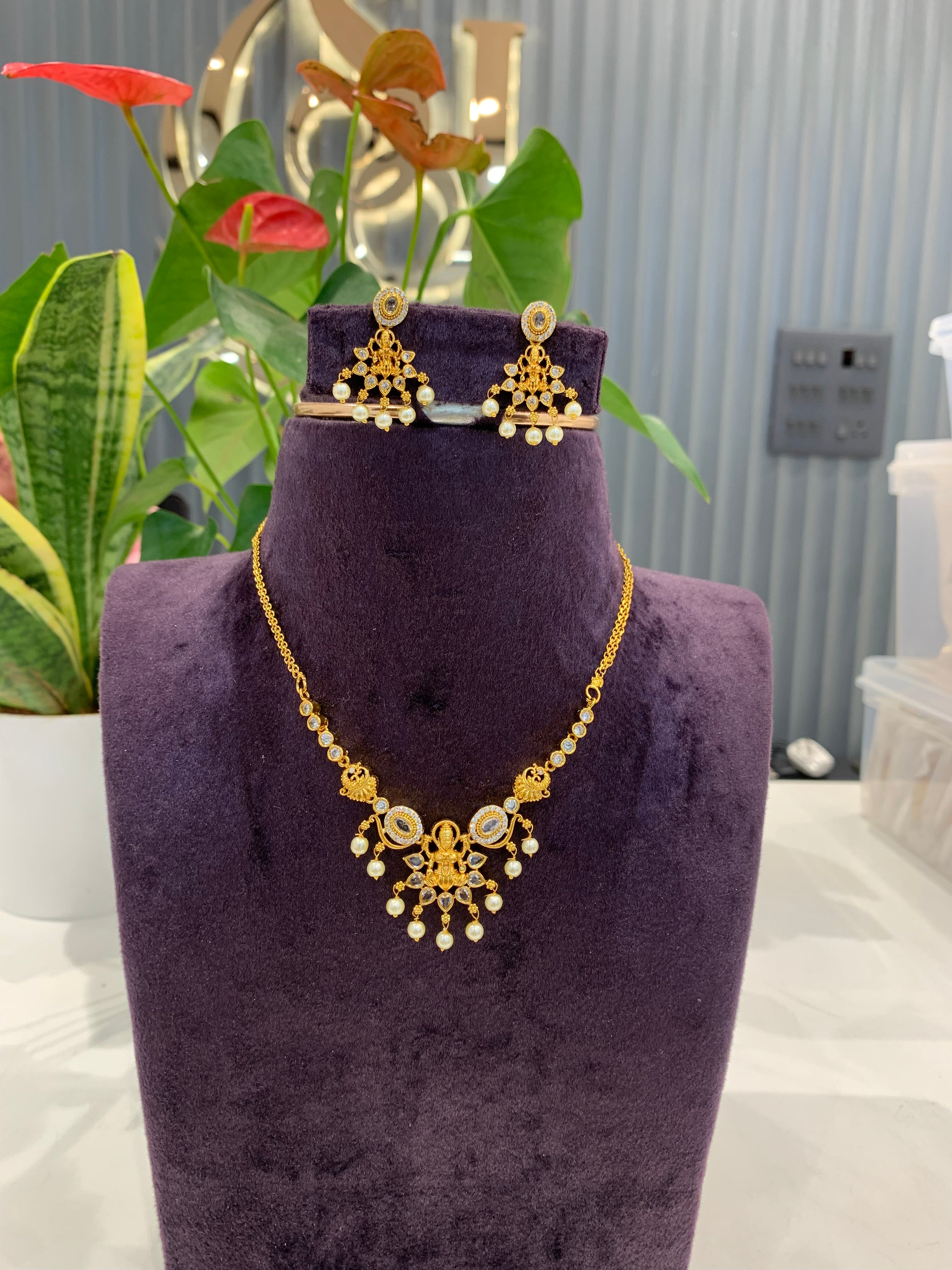 Beautiful simple white stone lakshmi devi necklace