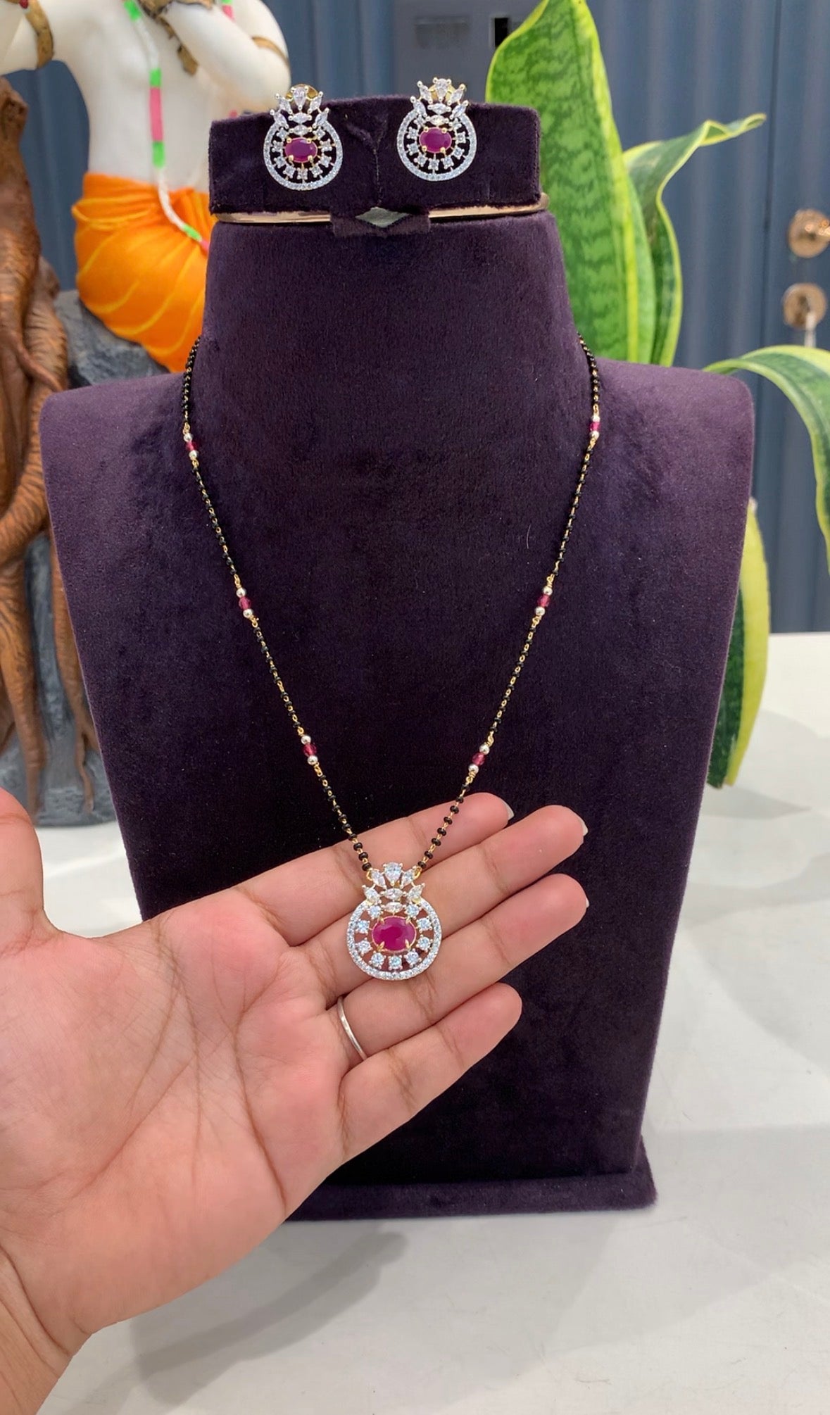 Beautiful diamond replica pendant set with customised blackbeads 18inchs