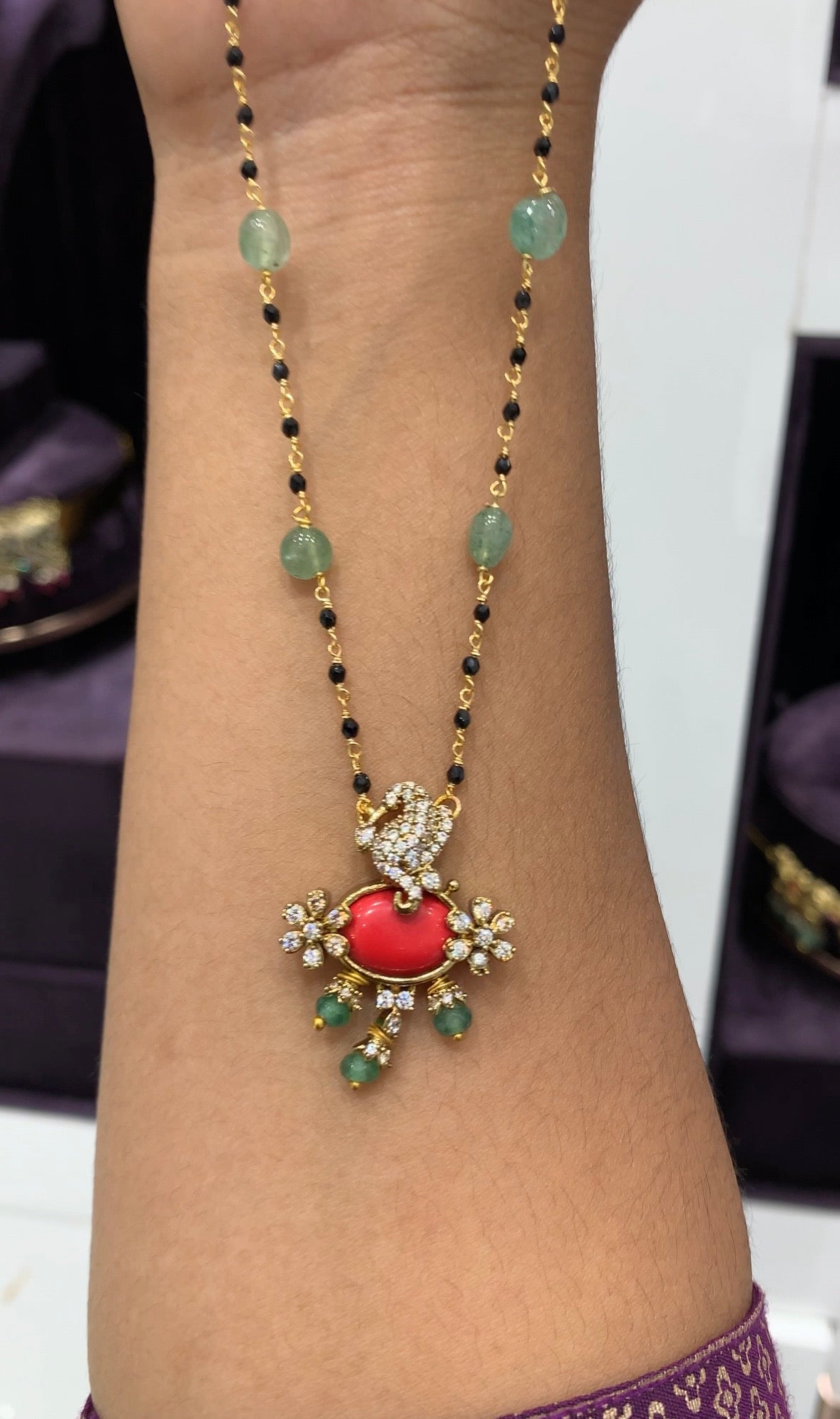 Beautiful Coral stone Vinayaka locket with Hand made black beads
