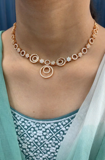 Beautiful rosegold necklace with earrings