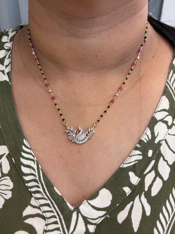GJ locket with hand made black beads