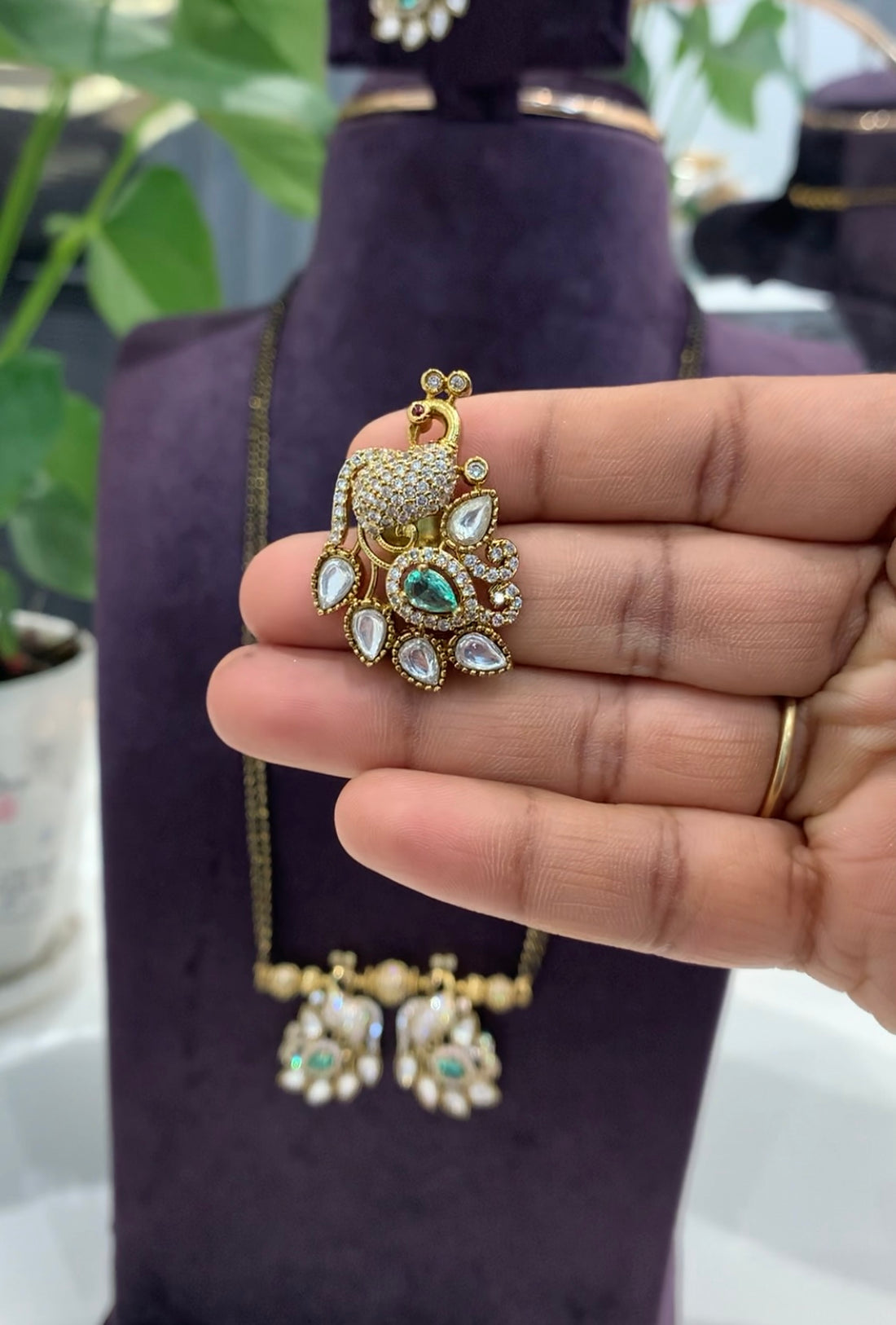 Beautiful Peacock Locket set with 24 inch long Black beads