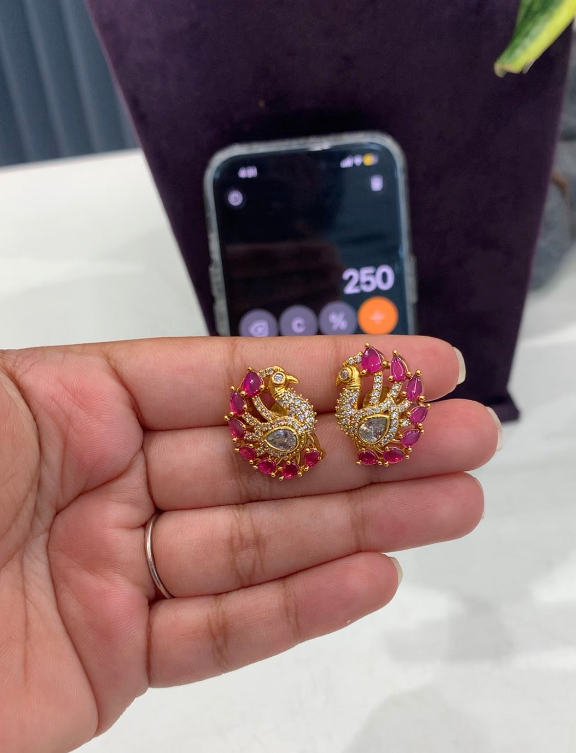 Beautiful peacock studs @ashadam offer
