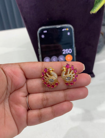 Beautiful peacock studs @ashadam offer