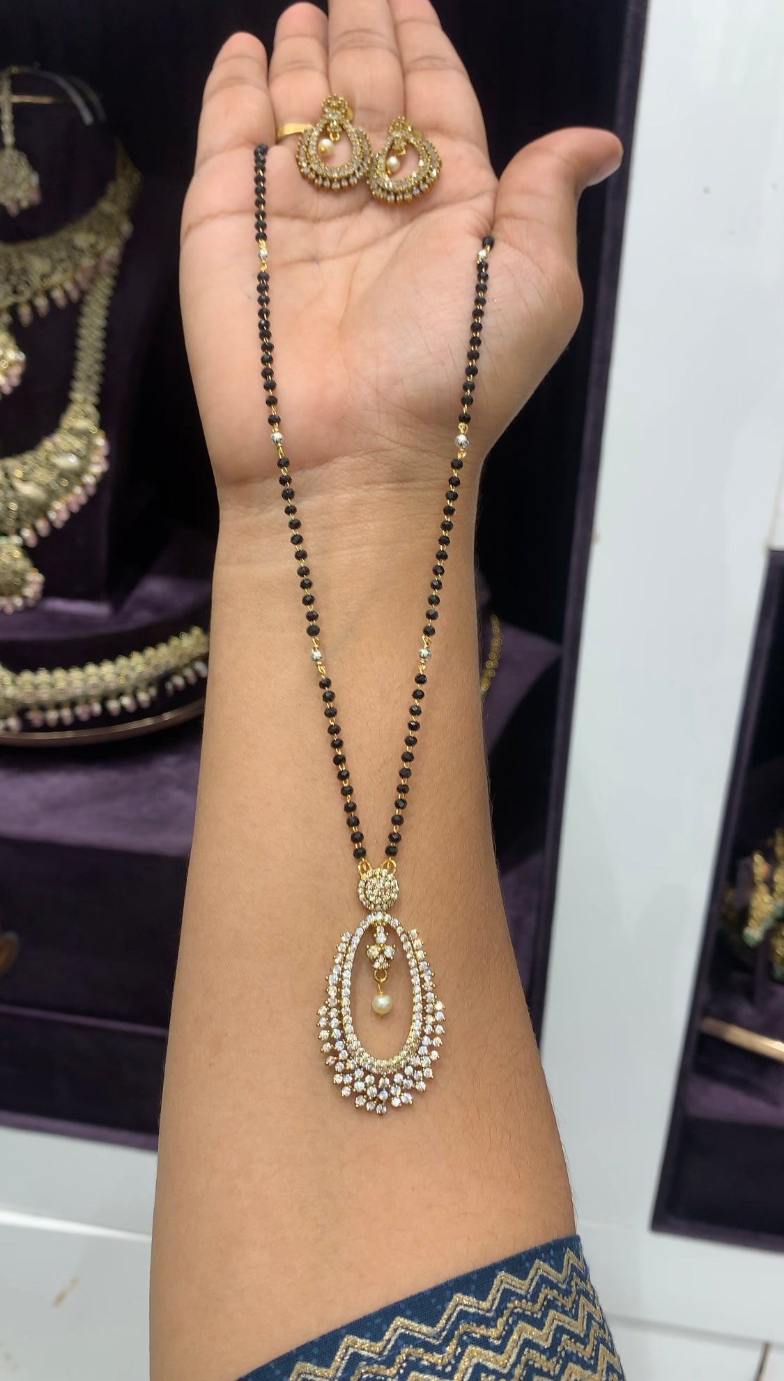 Beautiful locket set with Black beads