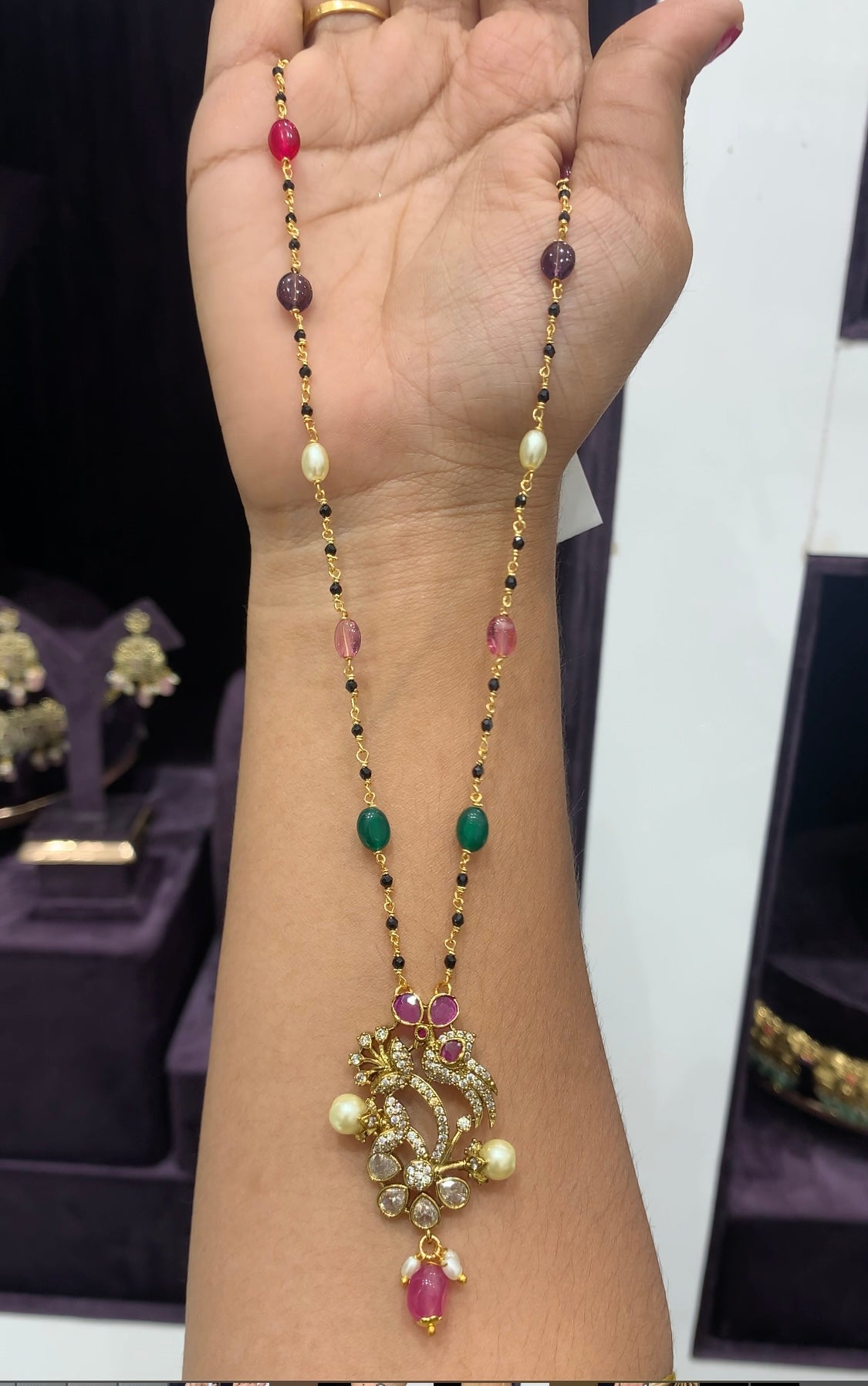 Beautiful locket with Navarathna Hand made Black beads