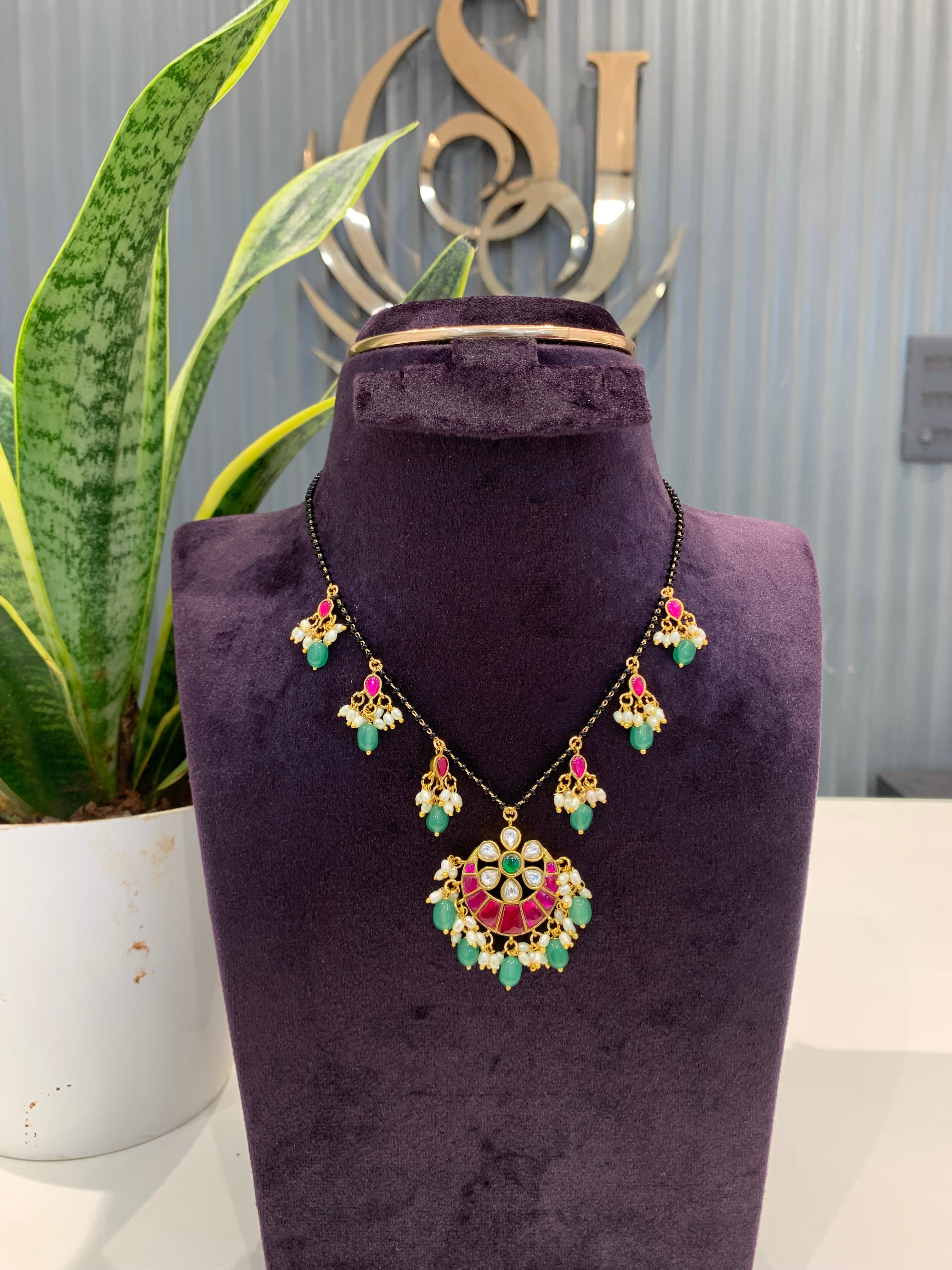 Beautiful Black beads with jadau stone Locket