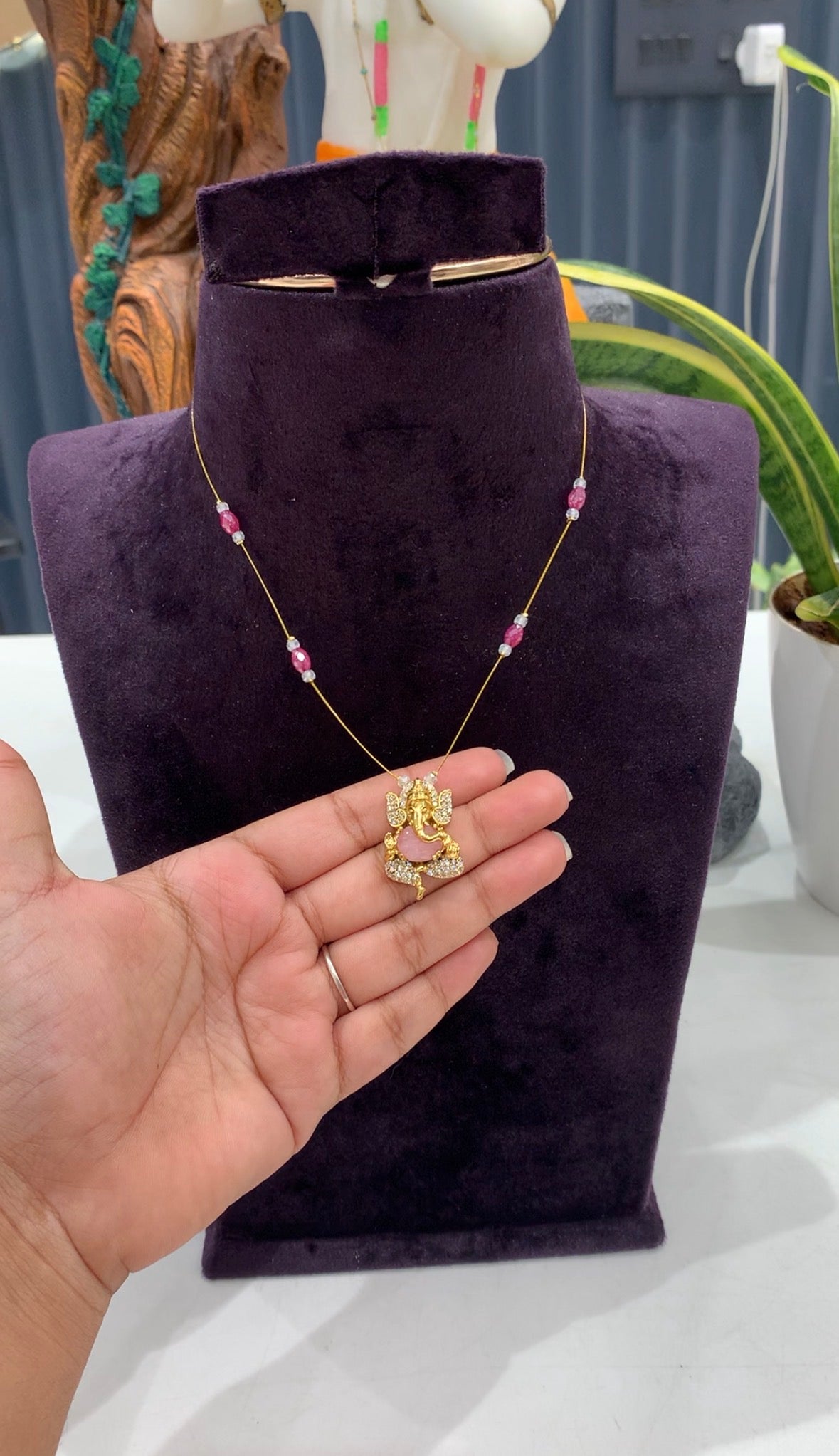 Beautiful Baby pink stone Ganesh pendent with invisible chain