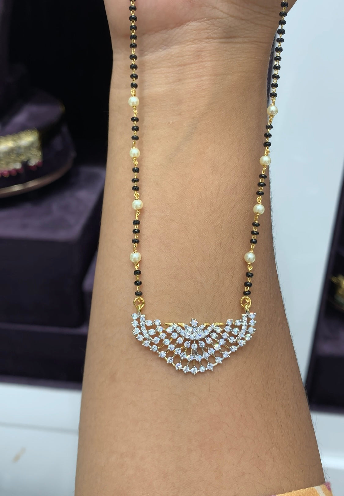 Beautiful GJ locket with Black beads