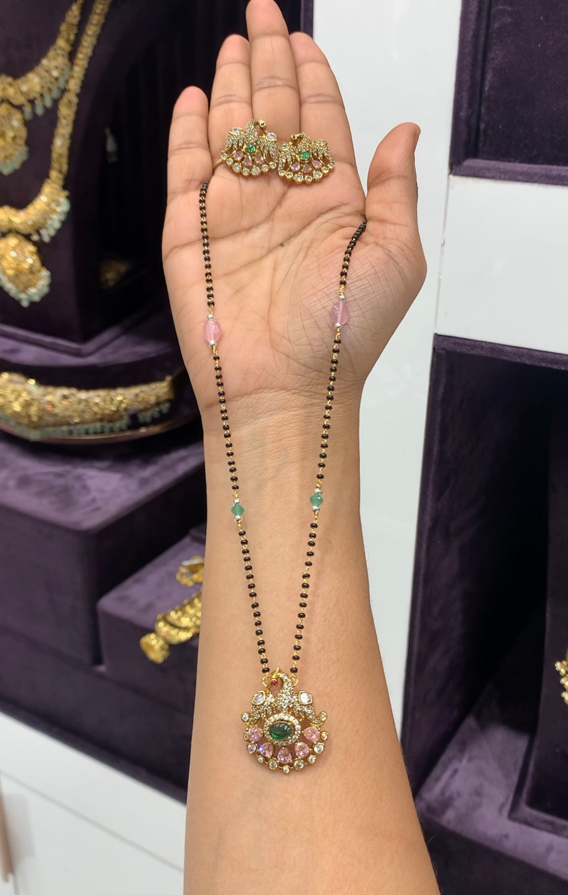 Beautiful locket set with black beads