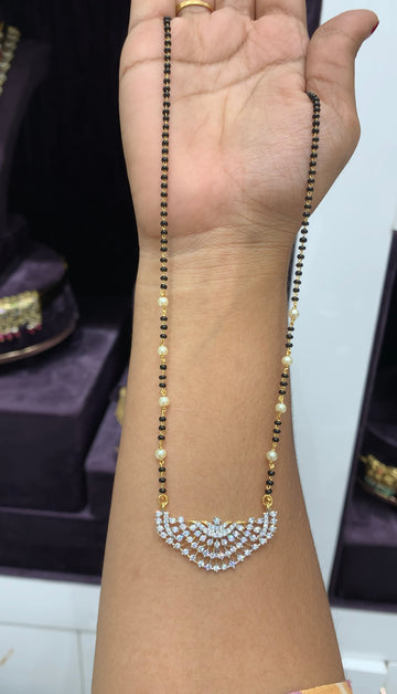 Beautiful GJ locket with Black beads