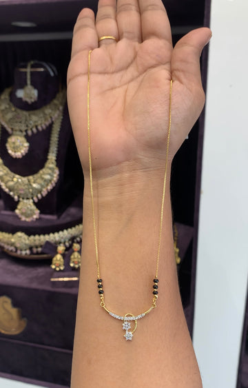 Beautiful GJ locket with Simple Black beads