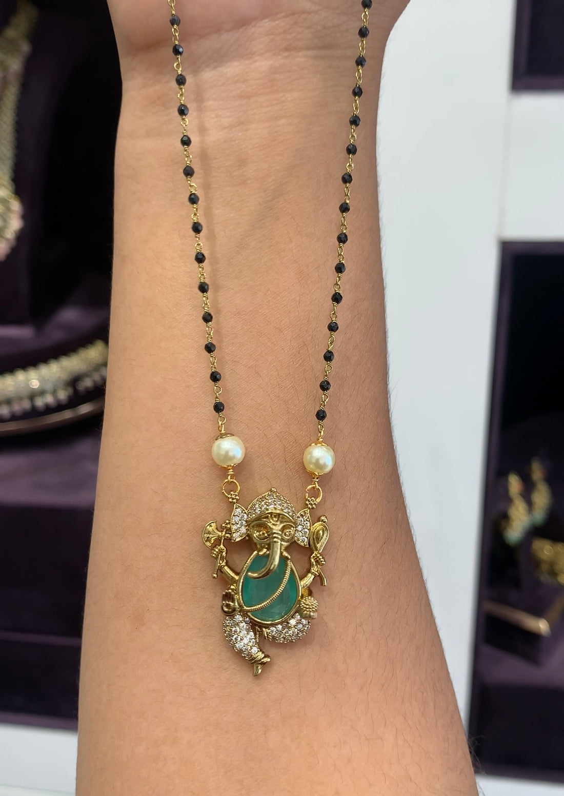 Beautiful Vinayaka locket with Black beads