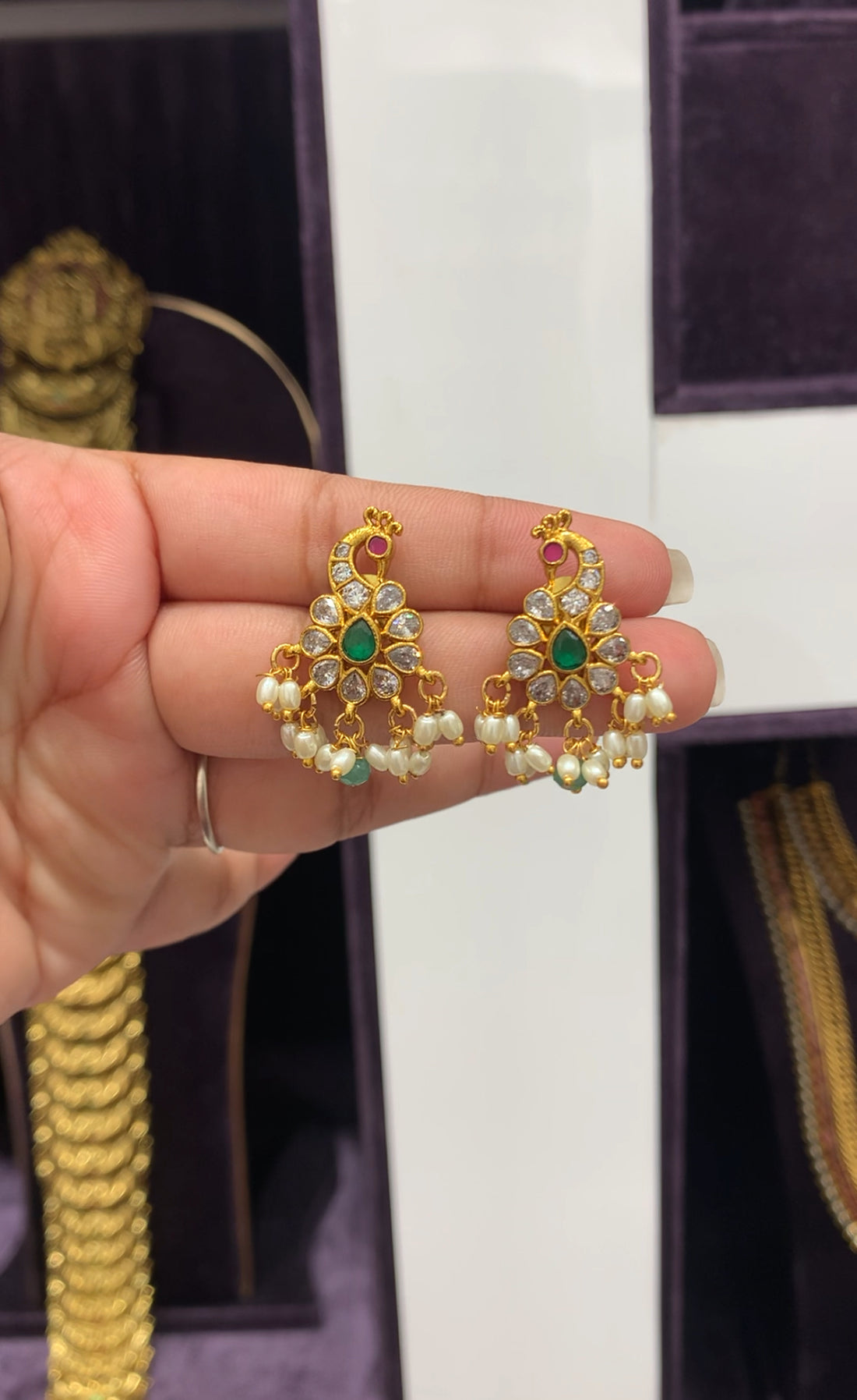Beautiful peacock earrings