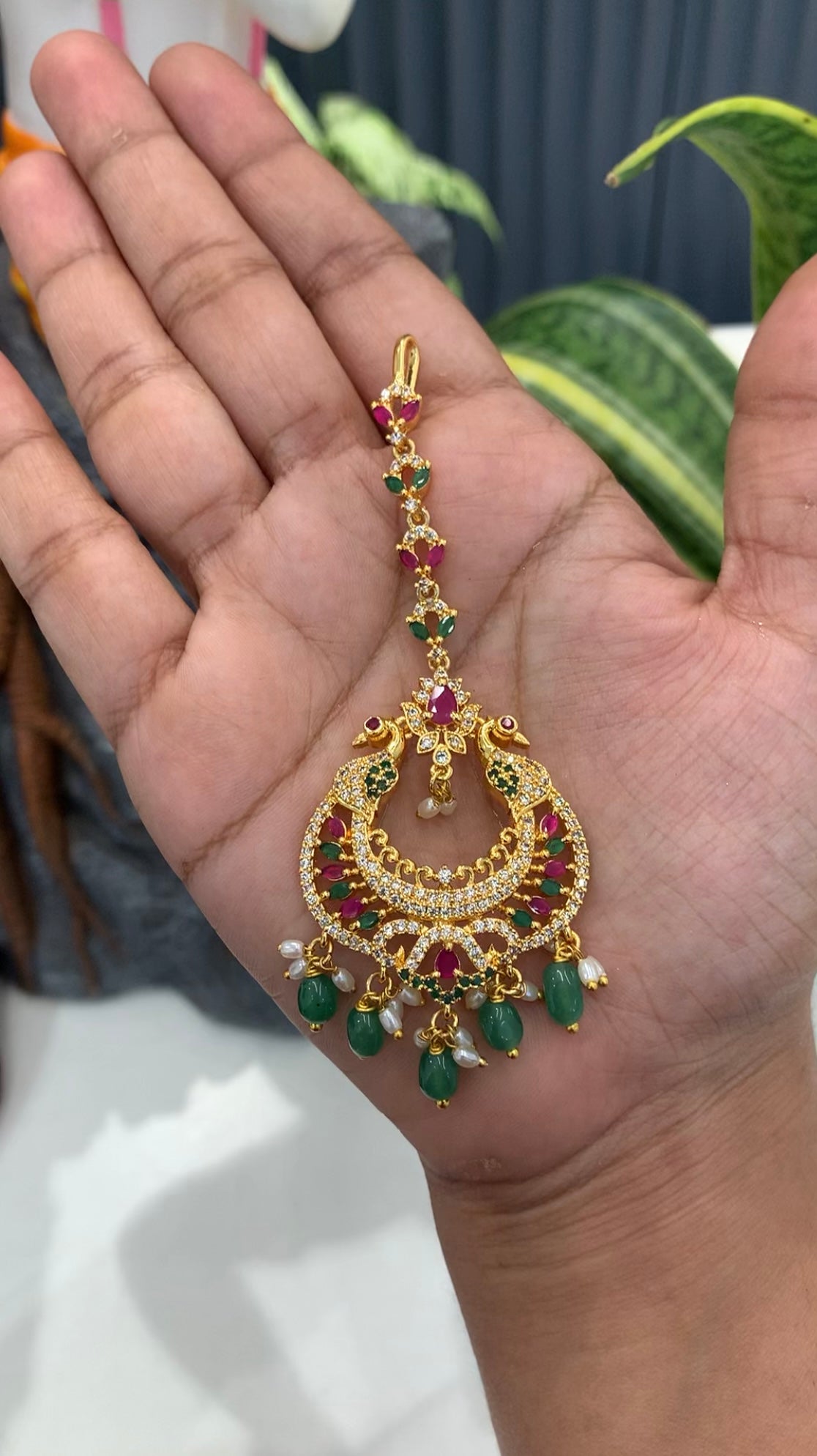 Beautiful Cz stone tikka with gold polish