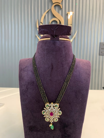 Premium 4 line crystal black beads with Multi stones pendent