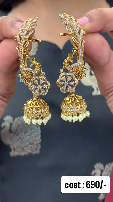 Beautiful peacock earcuffs