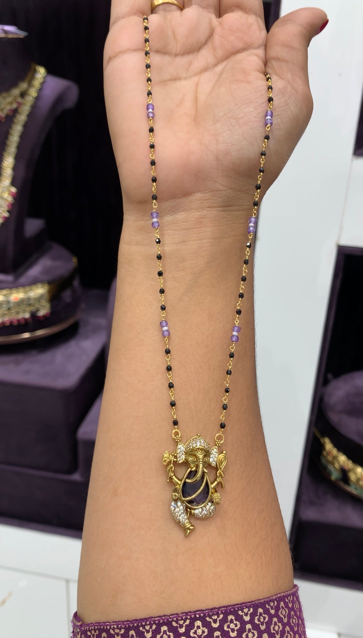 Beautiful Purple Stone Vinayaka locket with black beads