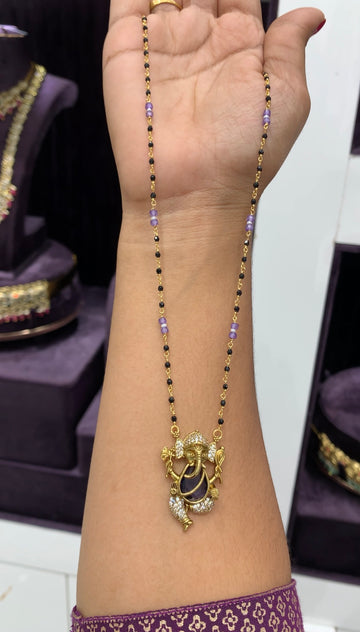 Beautiful Purple Stone Vinayaka locket with black beads