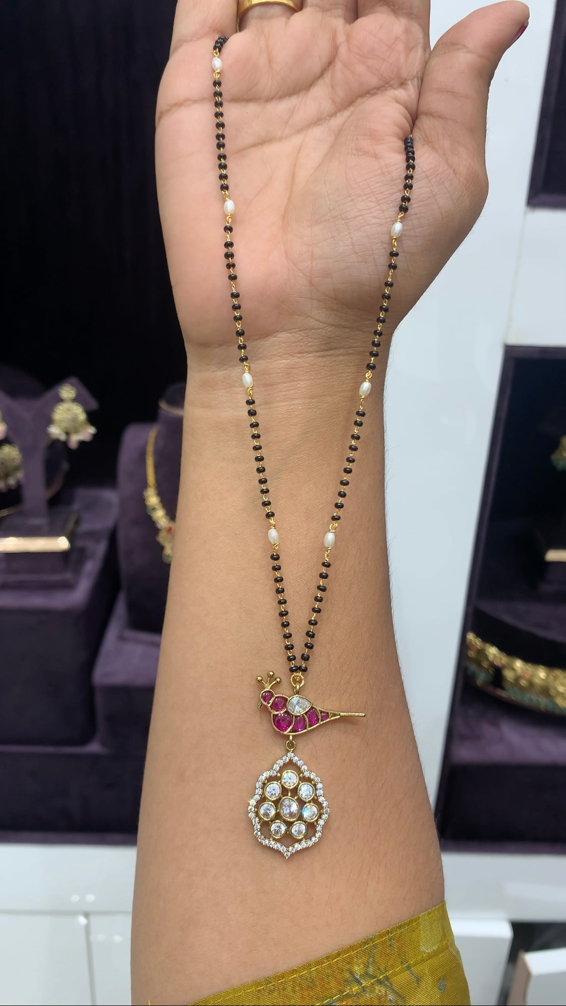 Beautiful Parrot locket with Black beads