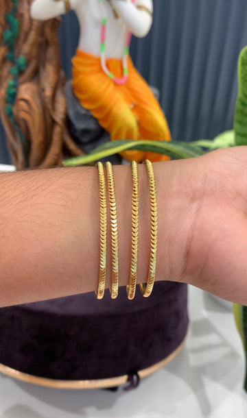 Beautiful gold replica bangles set of 4