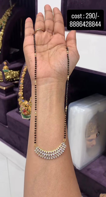 Beautiful diamond replica locket with 18inchs blackbeads