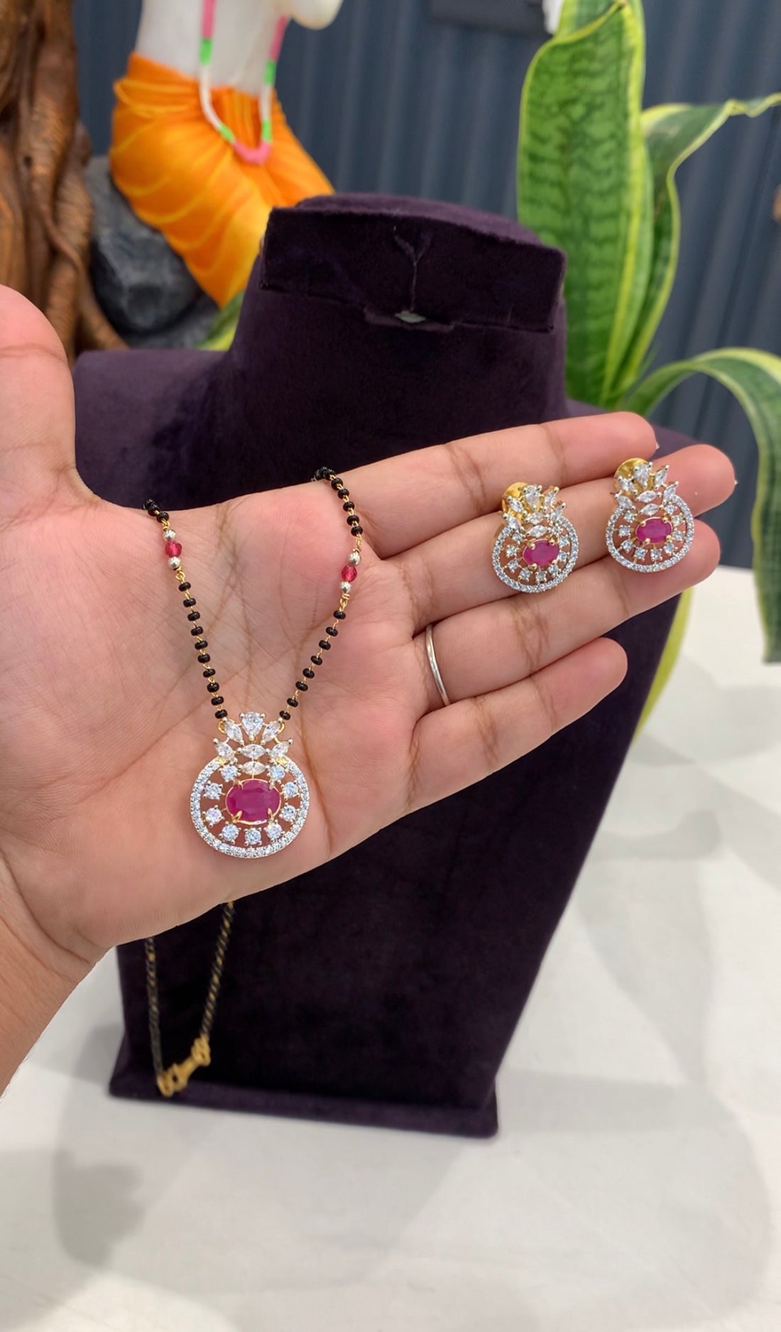 Beautiful diamond replica pendant set with customised blackbeads 18inchs