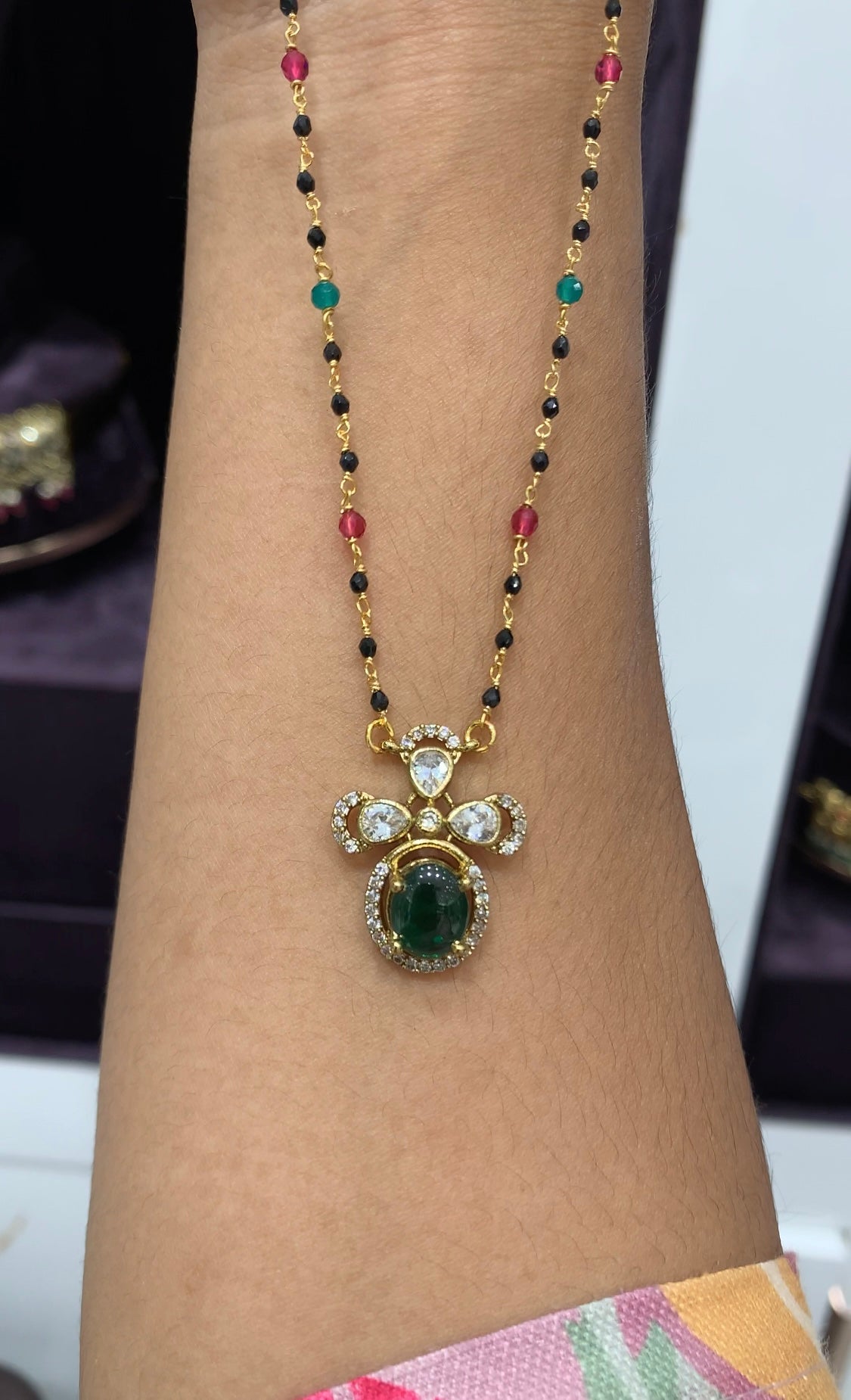 Cute Green uncut stone locket with Black beads