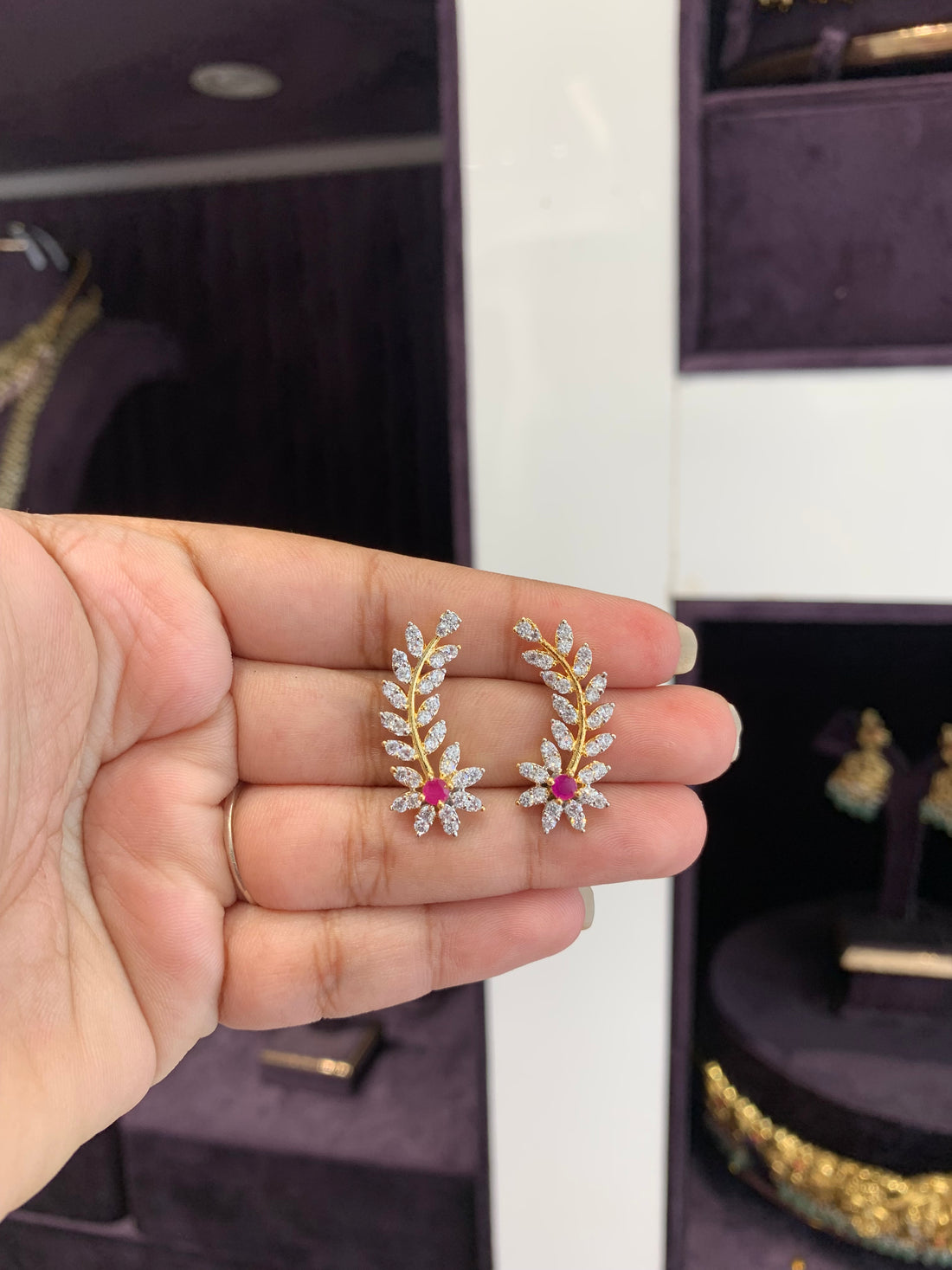 Beautiful nd stylish earcuffs model with ruby stone back stopper