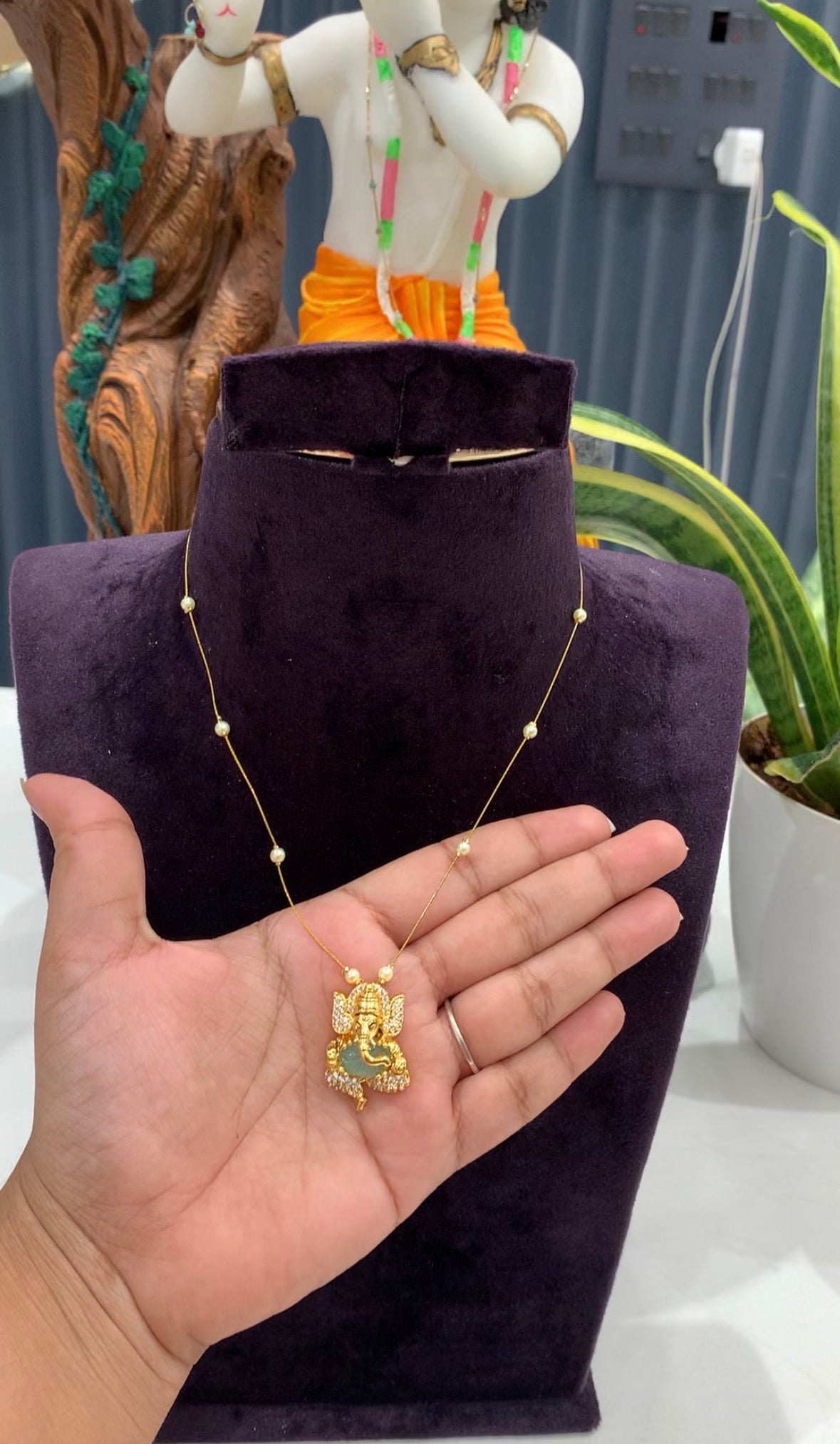 Beautiful Aqua stone Ganesh pendent with invisible chain