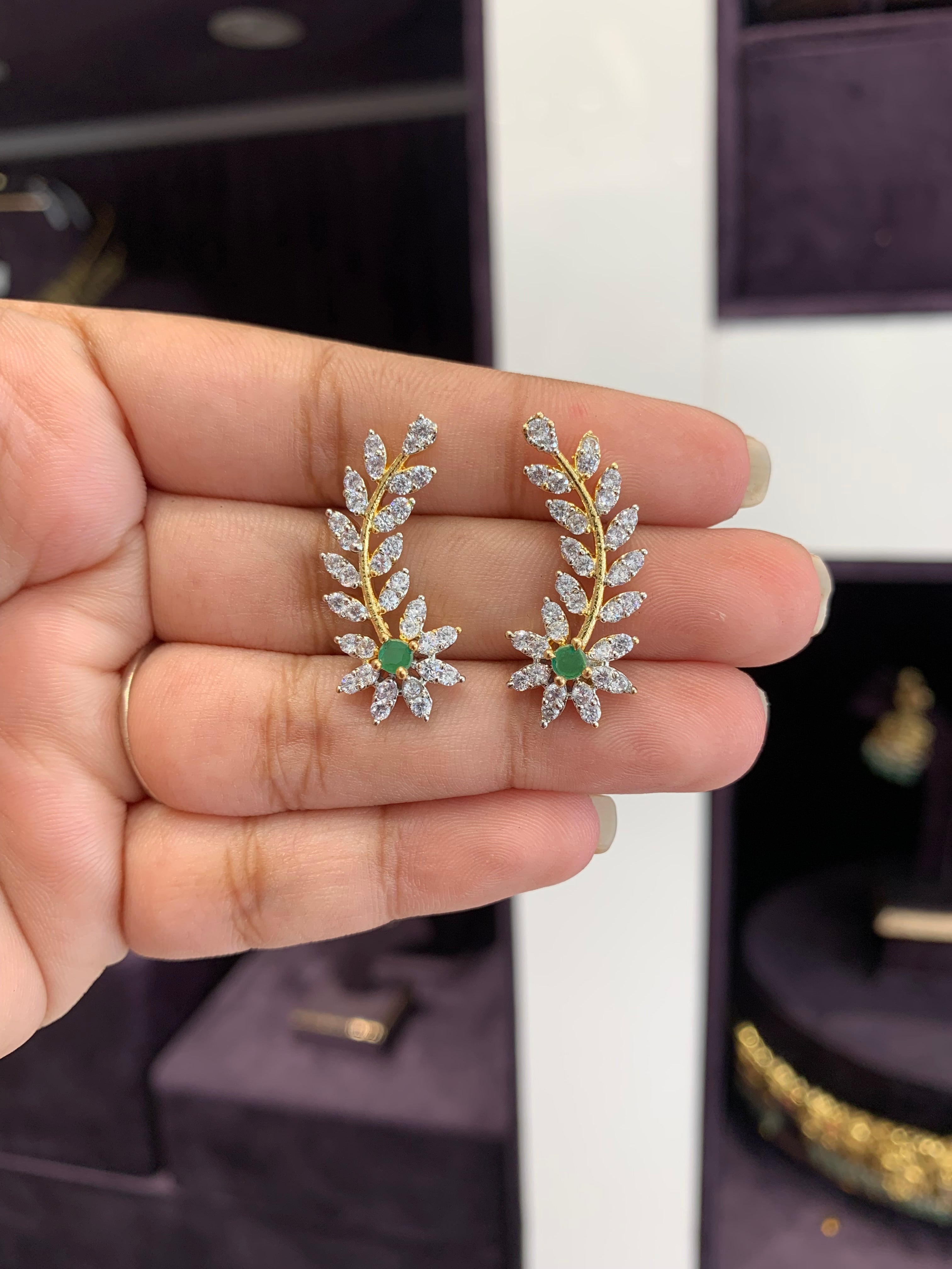 Beautiful nd stylish earcuffs model with green stone back stopper