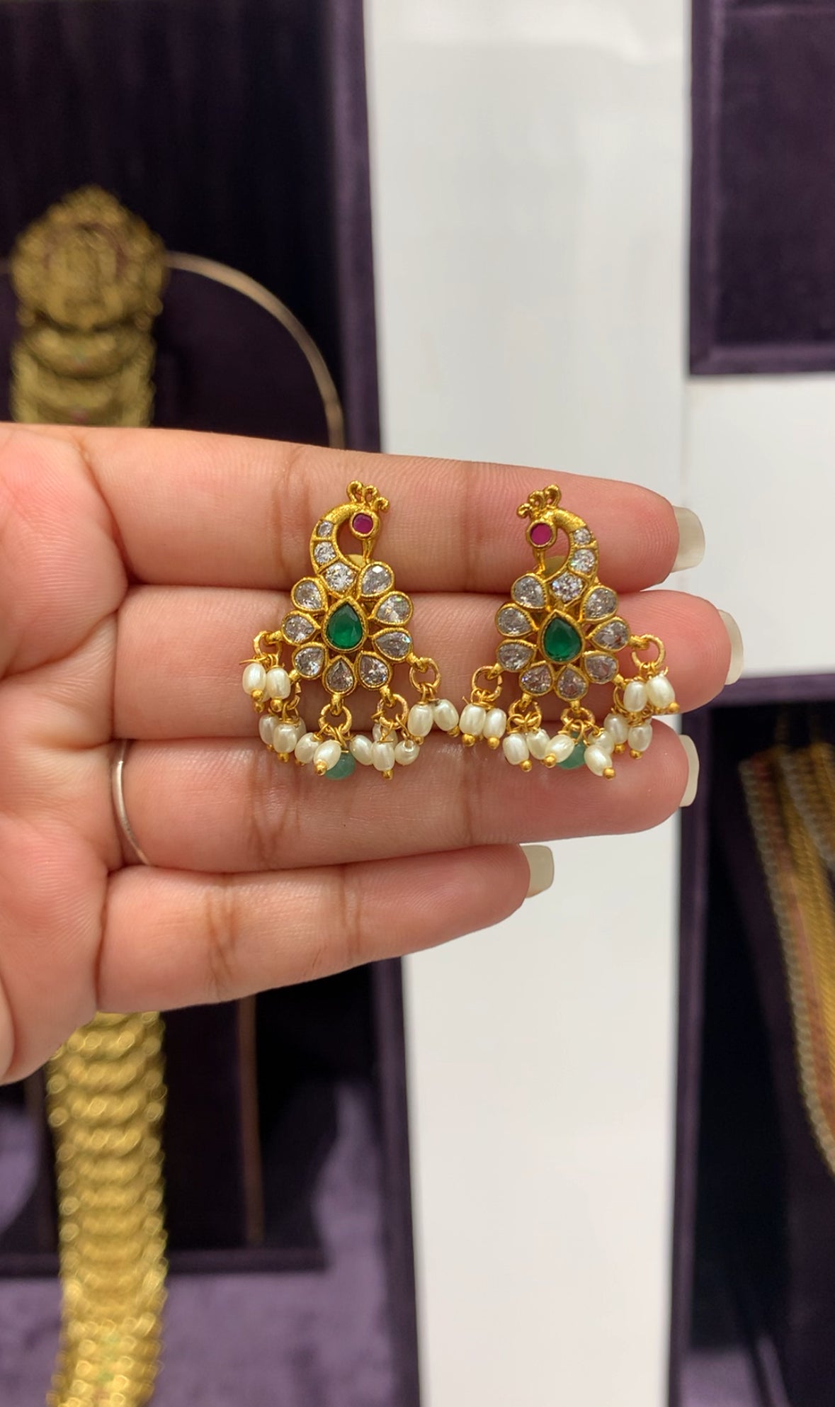 Beautiful peacock earrings