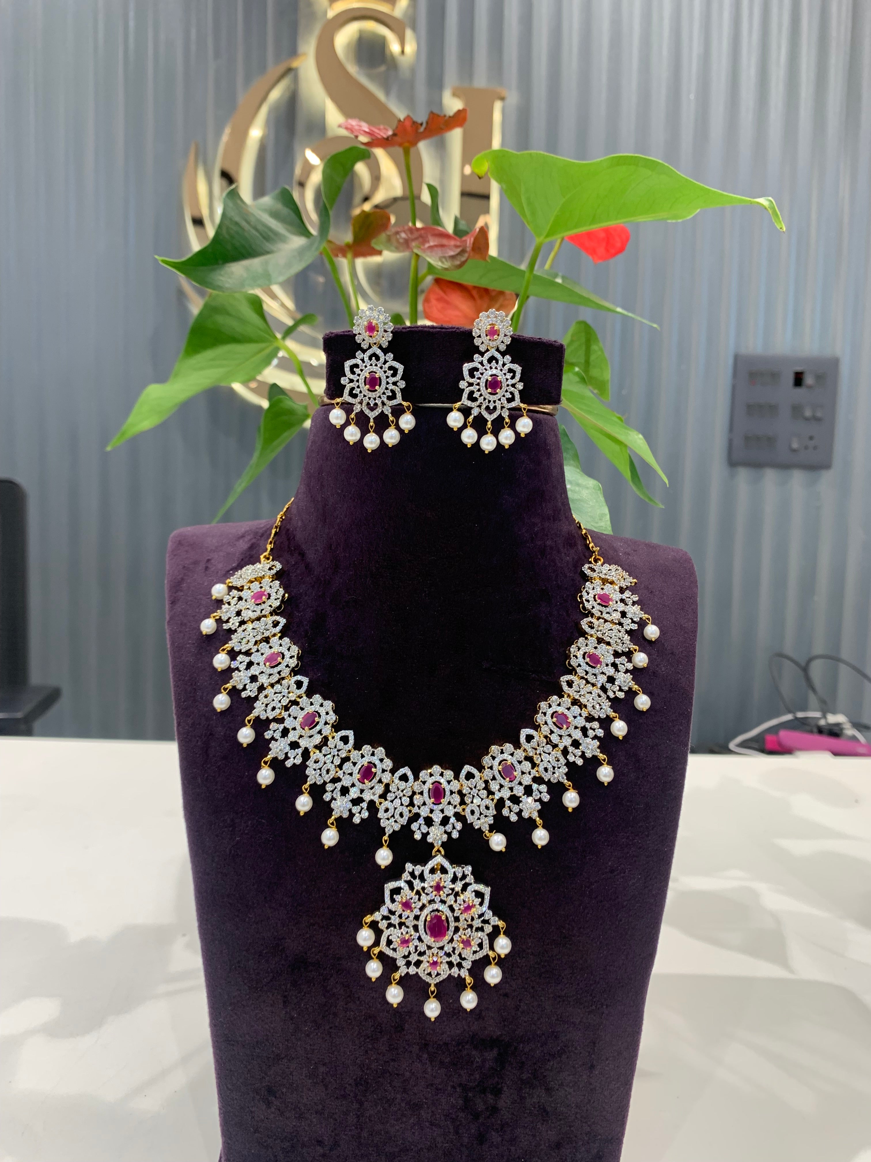 Beautiful GJ polish short necklace with pink stone