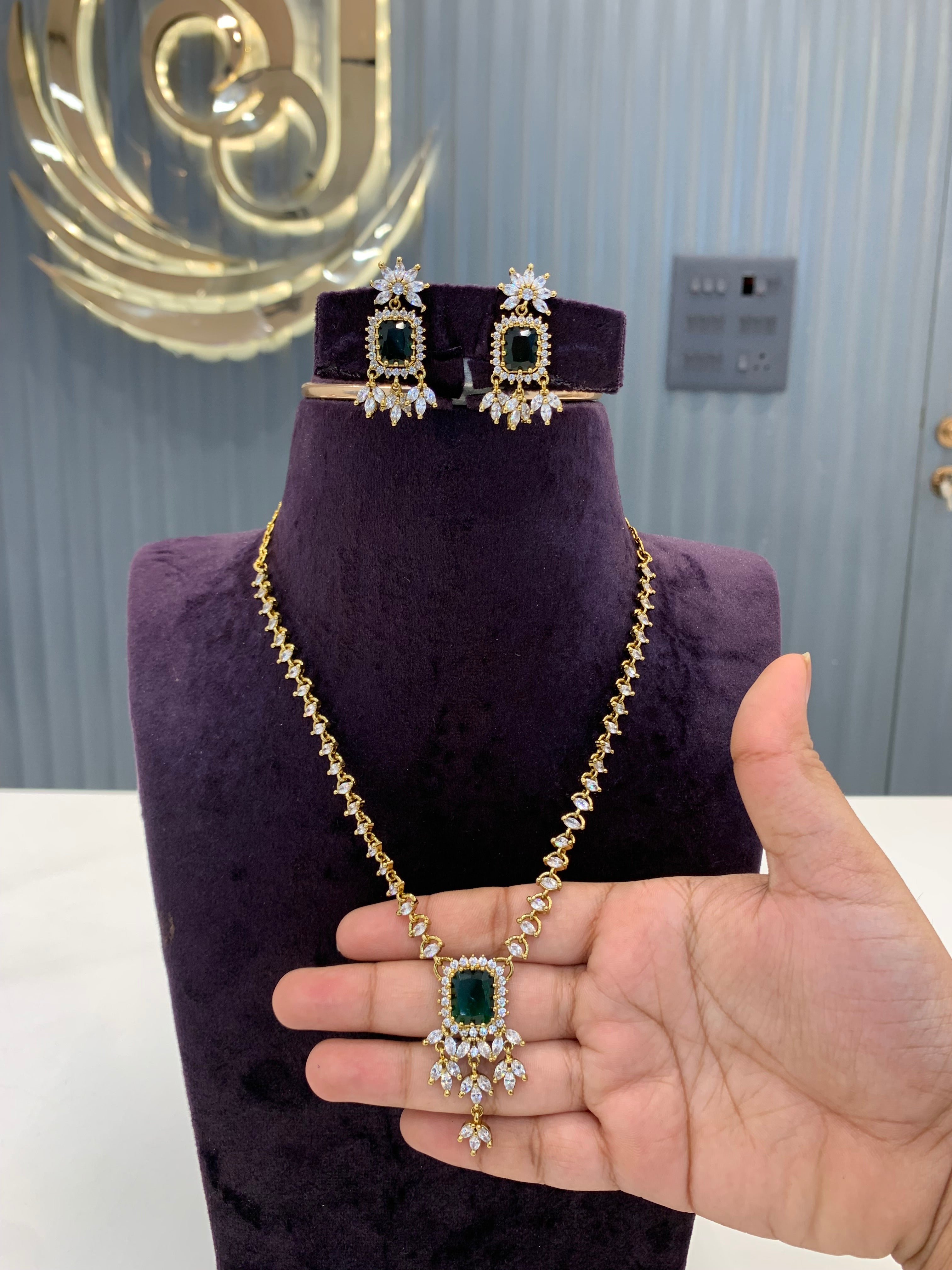 Beautiful trendy necklace with green stone