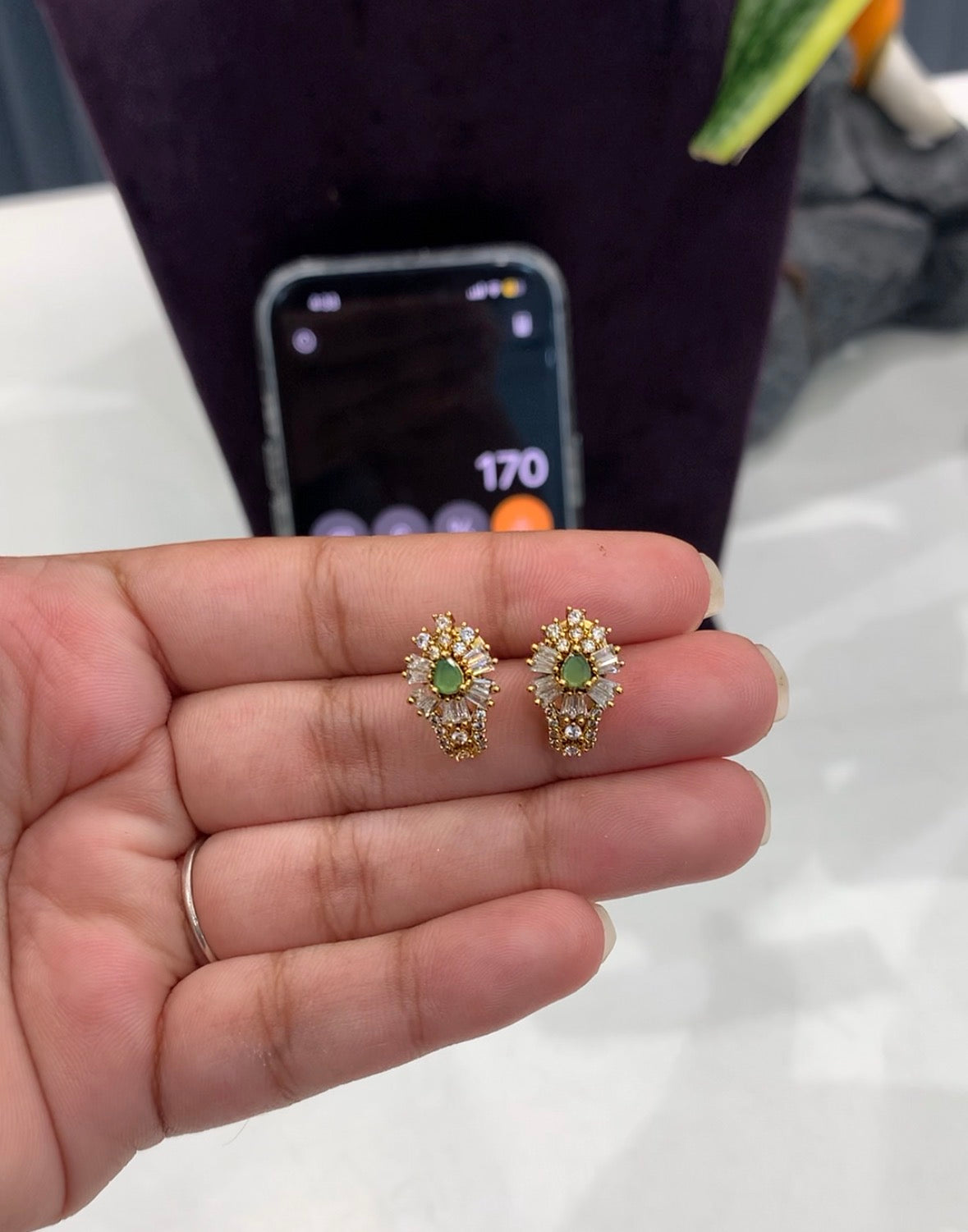 Beautiful Green stone studs @ashadam offer