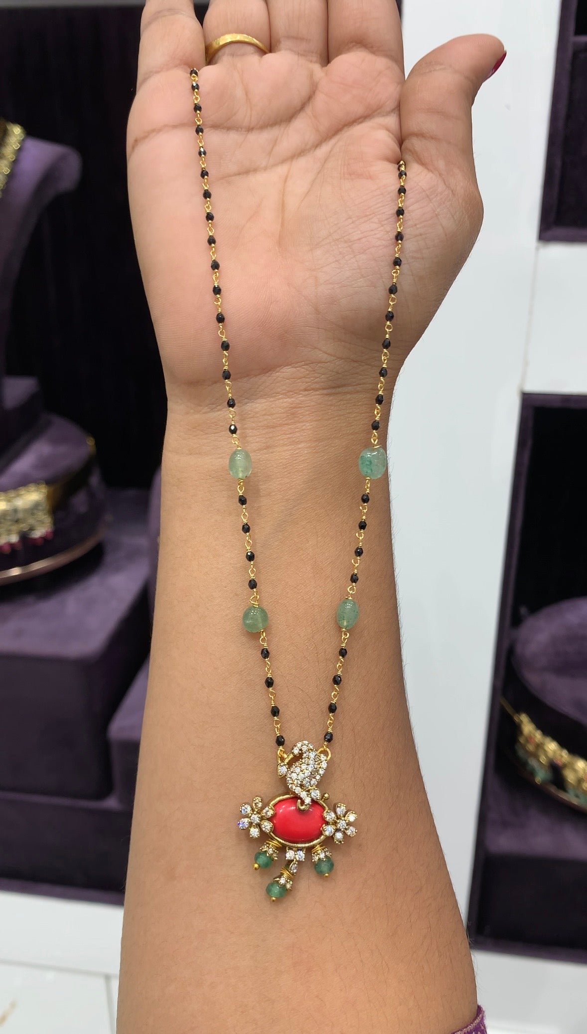Beautiful Coral stone Vinayaka locket with Hand made black beads