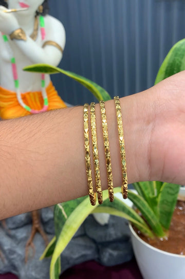 Beautiful gold replica bangles set of 4