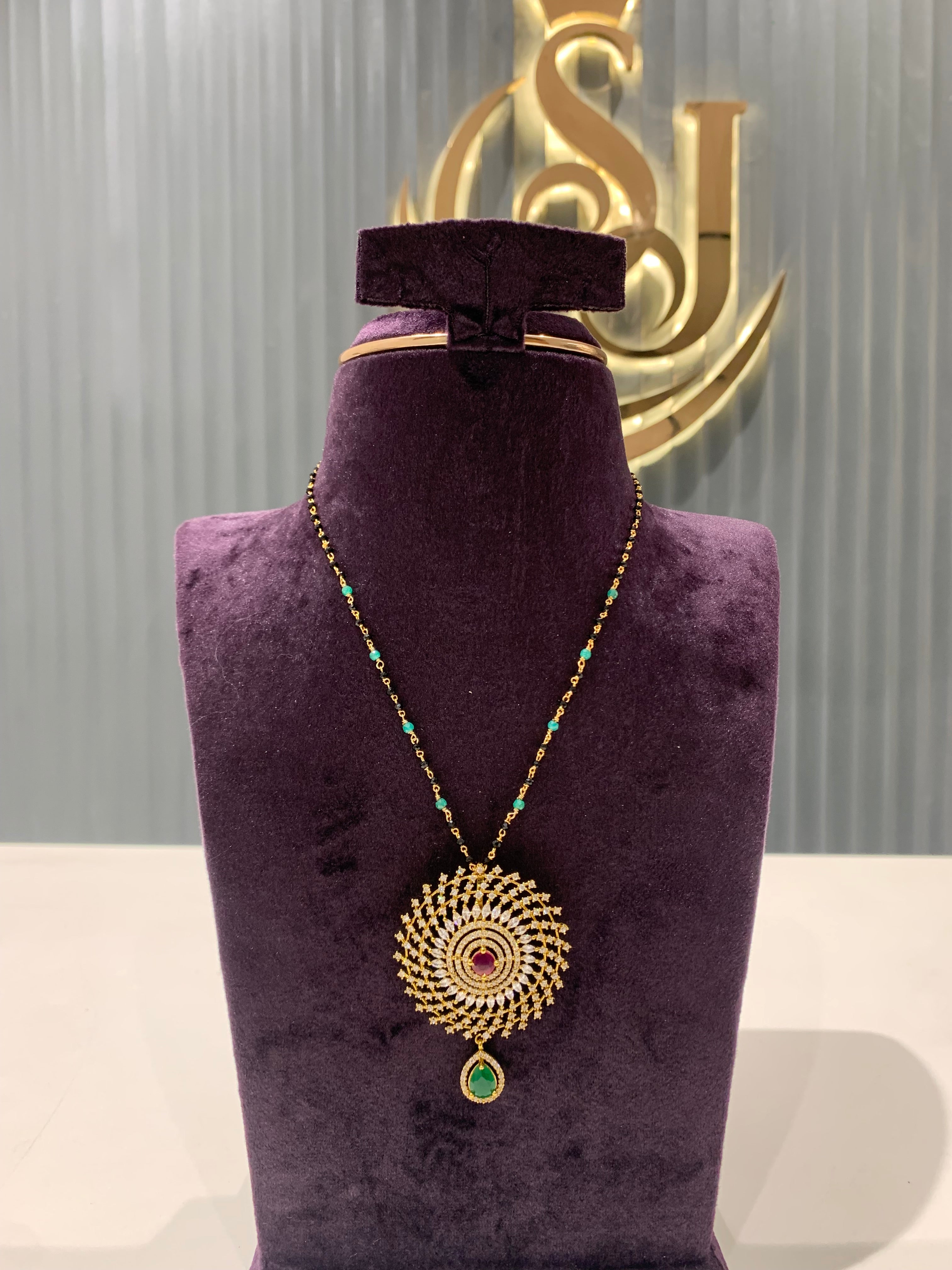 Beautiful pendent with black beads