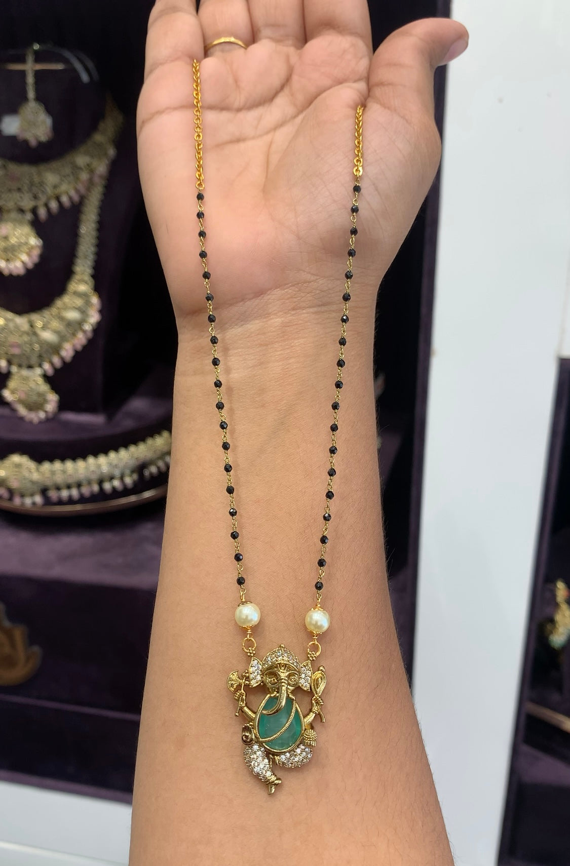 Beautiful Vinayaka locket with Black beads