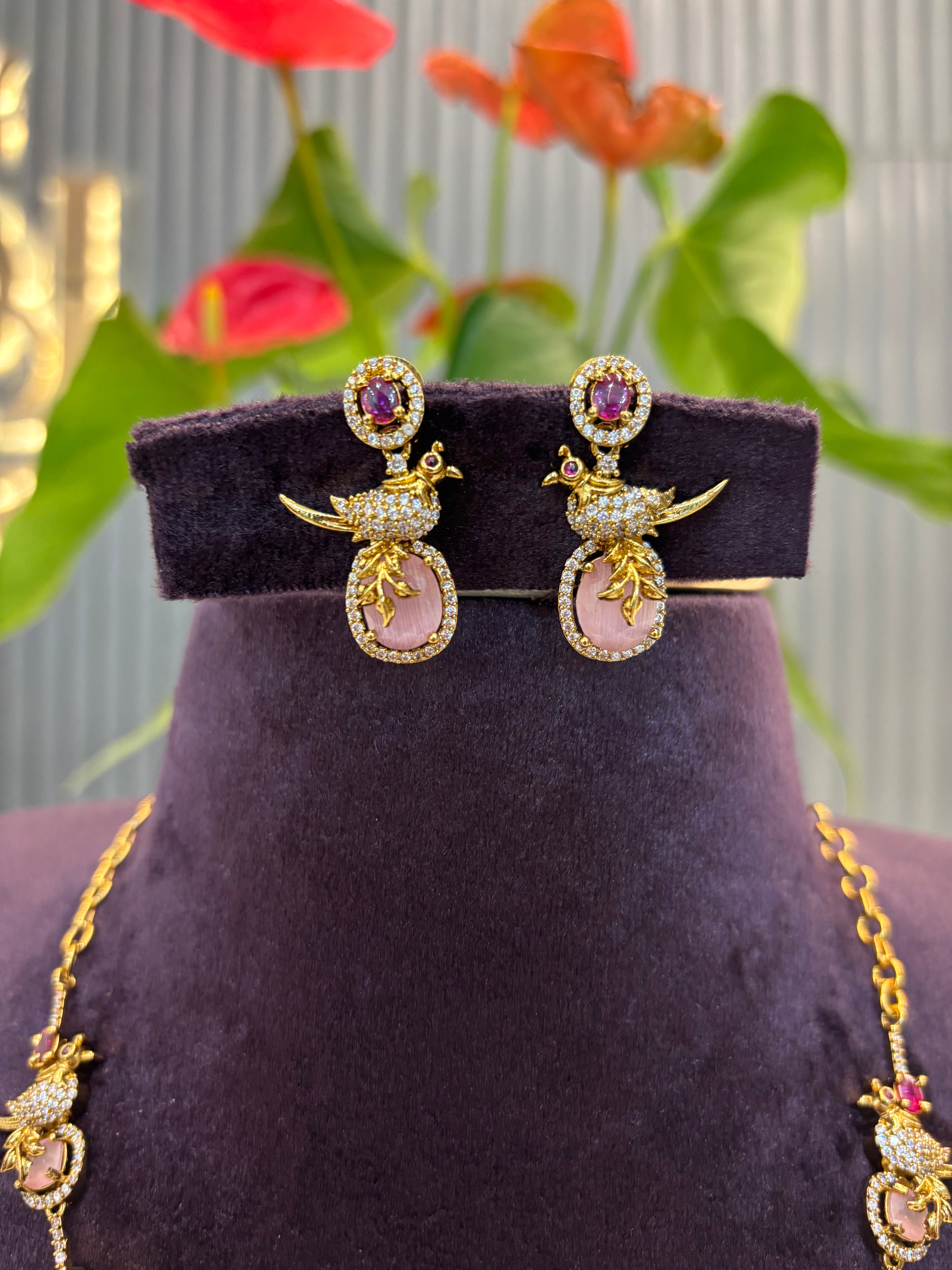 Beautiful pastelsl Pink stone parrot necklace