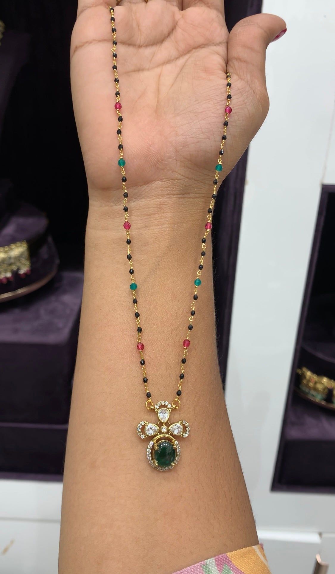 Cute Green uncut stone locket with Black beads